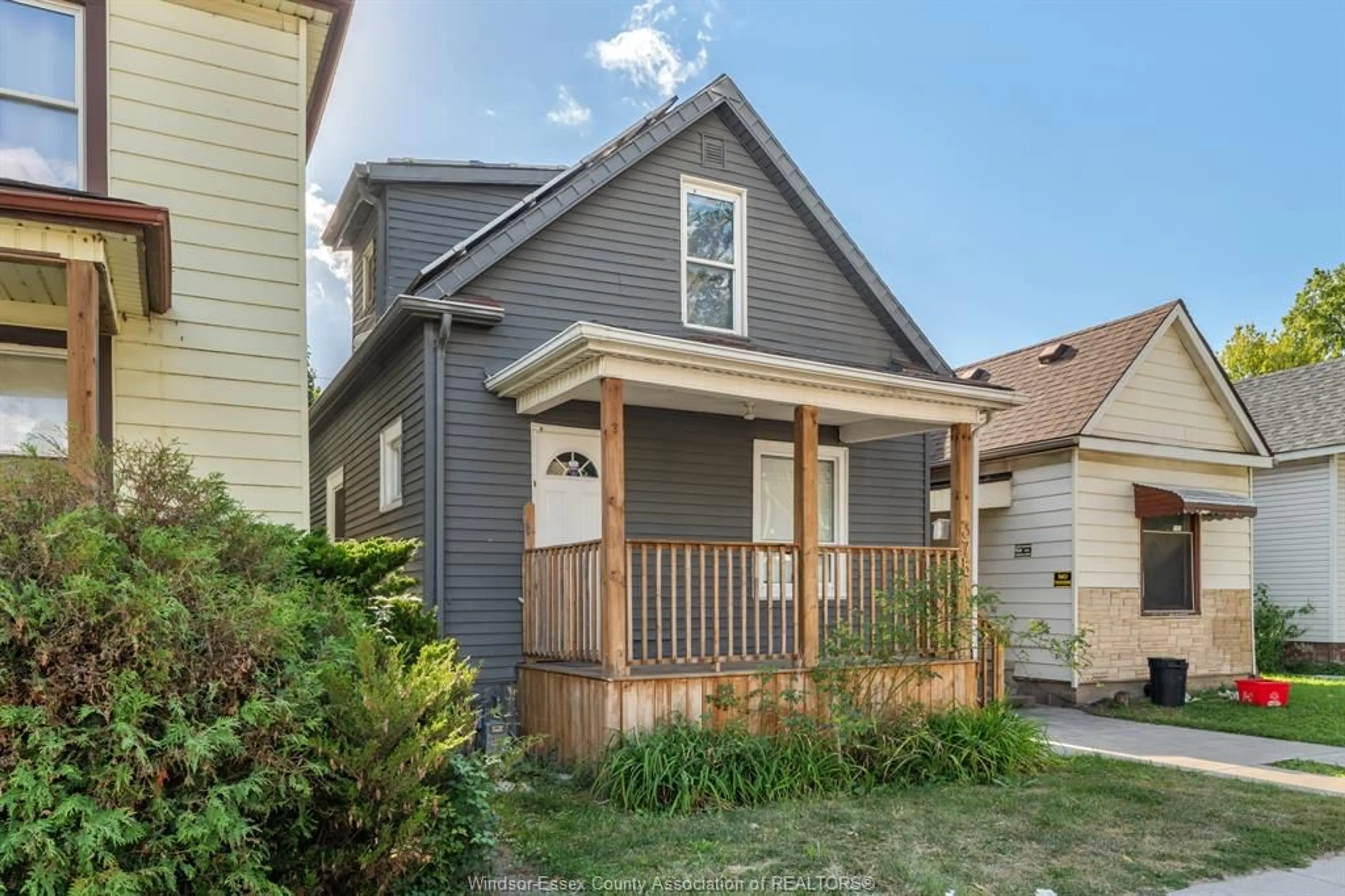 Home with vinyl exterior material, street for 375 BRIDGE Ave, Windsor Ontario N9B 2M3