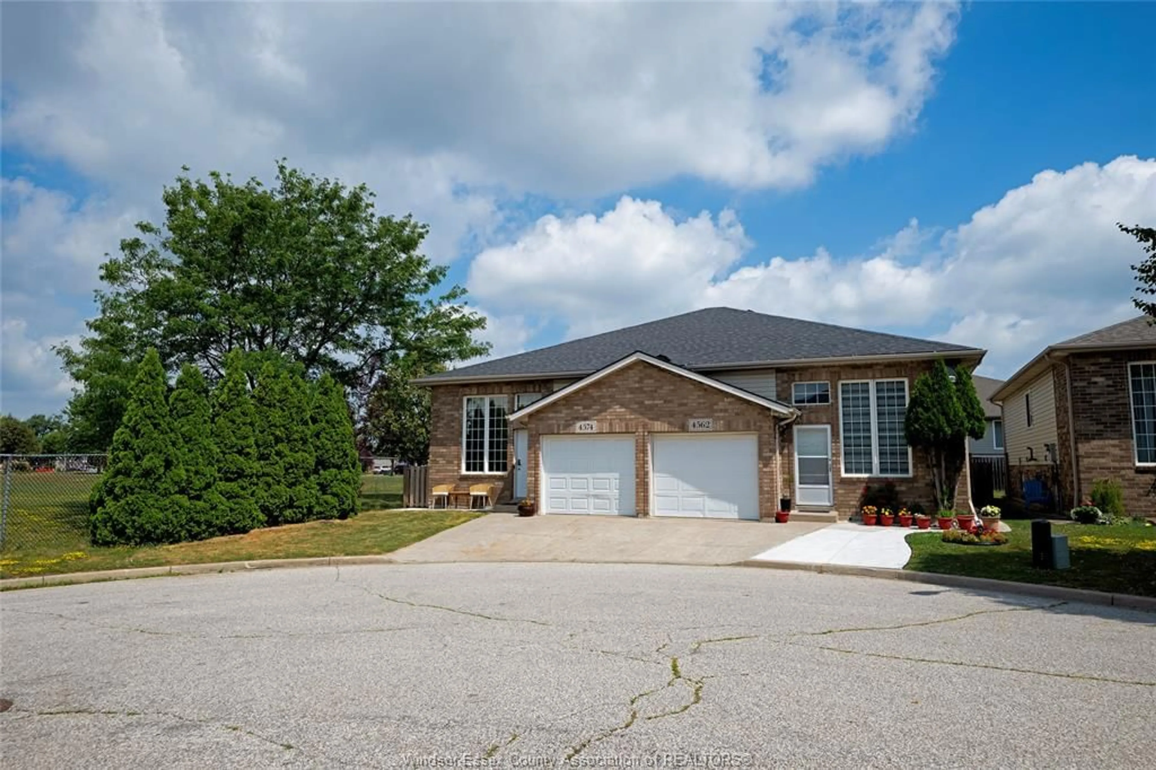 Home with brick exterior material, street for 4574 TUMBLEWEED Cres, Windsor Ontario N9G 3C2