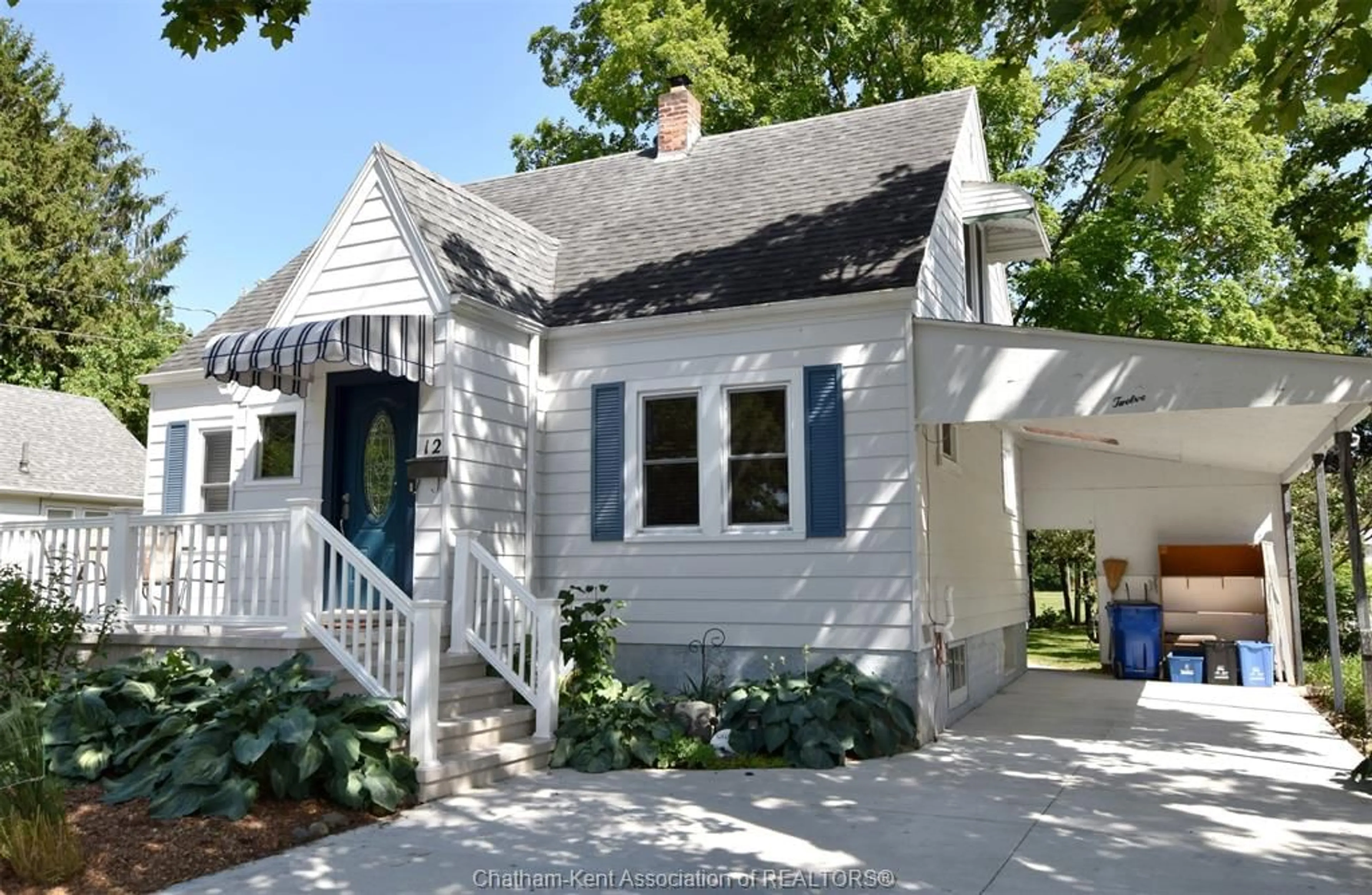 Home with vinyl exterior material, street for 12 Alexandra Ave, Chatham Ontario N7M 1Y1