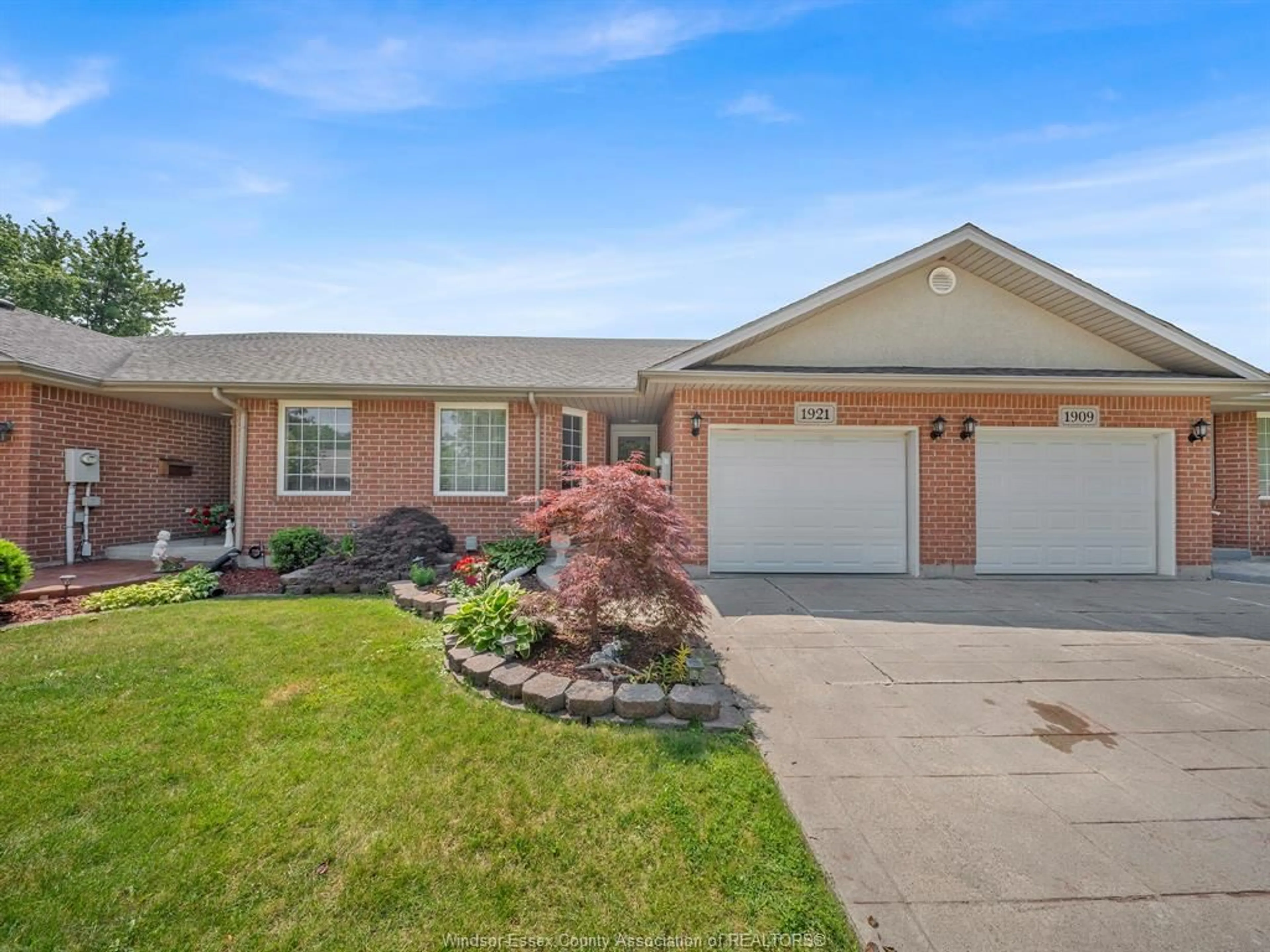 Home with brick exterior material, street for 1921 QUESTA, Windsor Ontario N8P 1M5