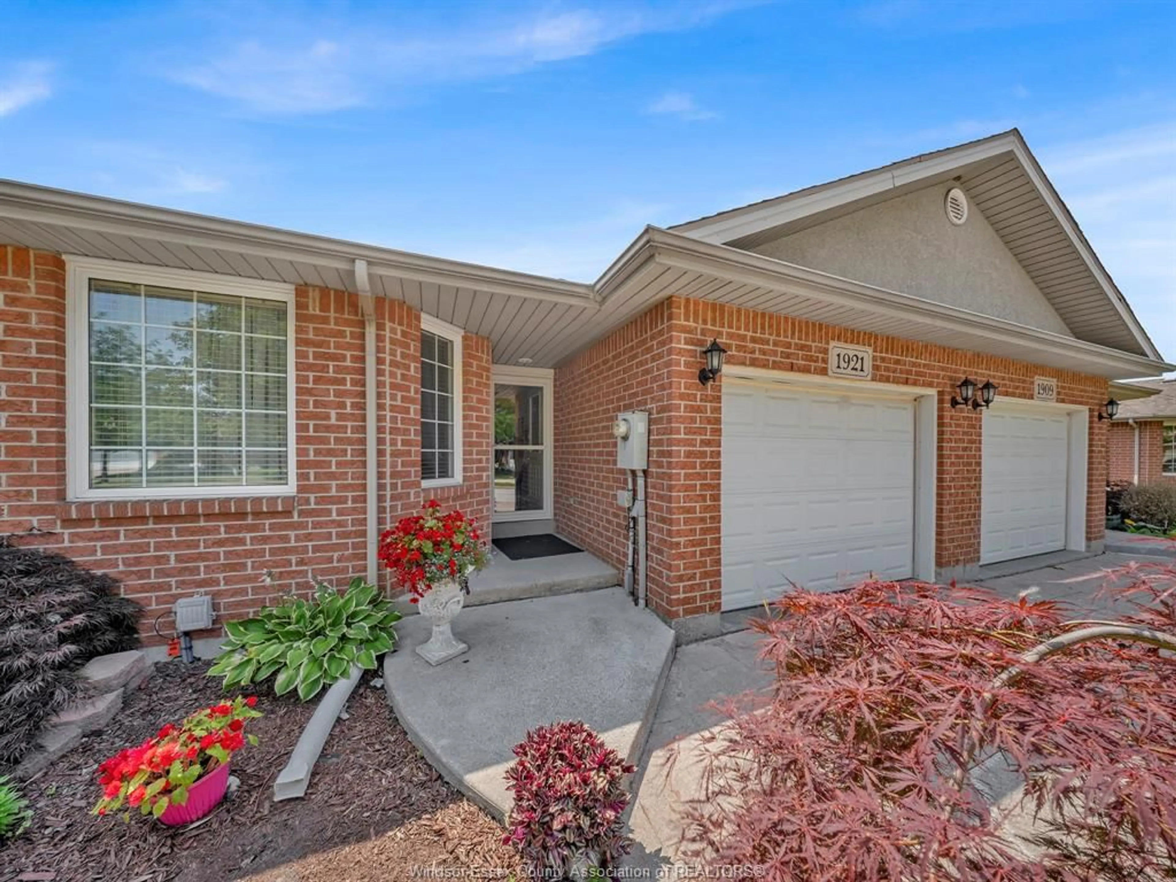 Home with brick exterior material, street for 1921 QUESTA, Windsor Ontario N8P 1M5