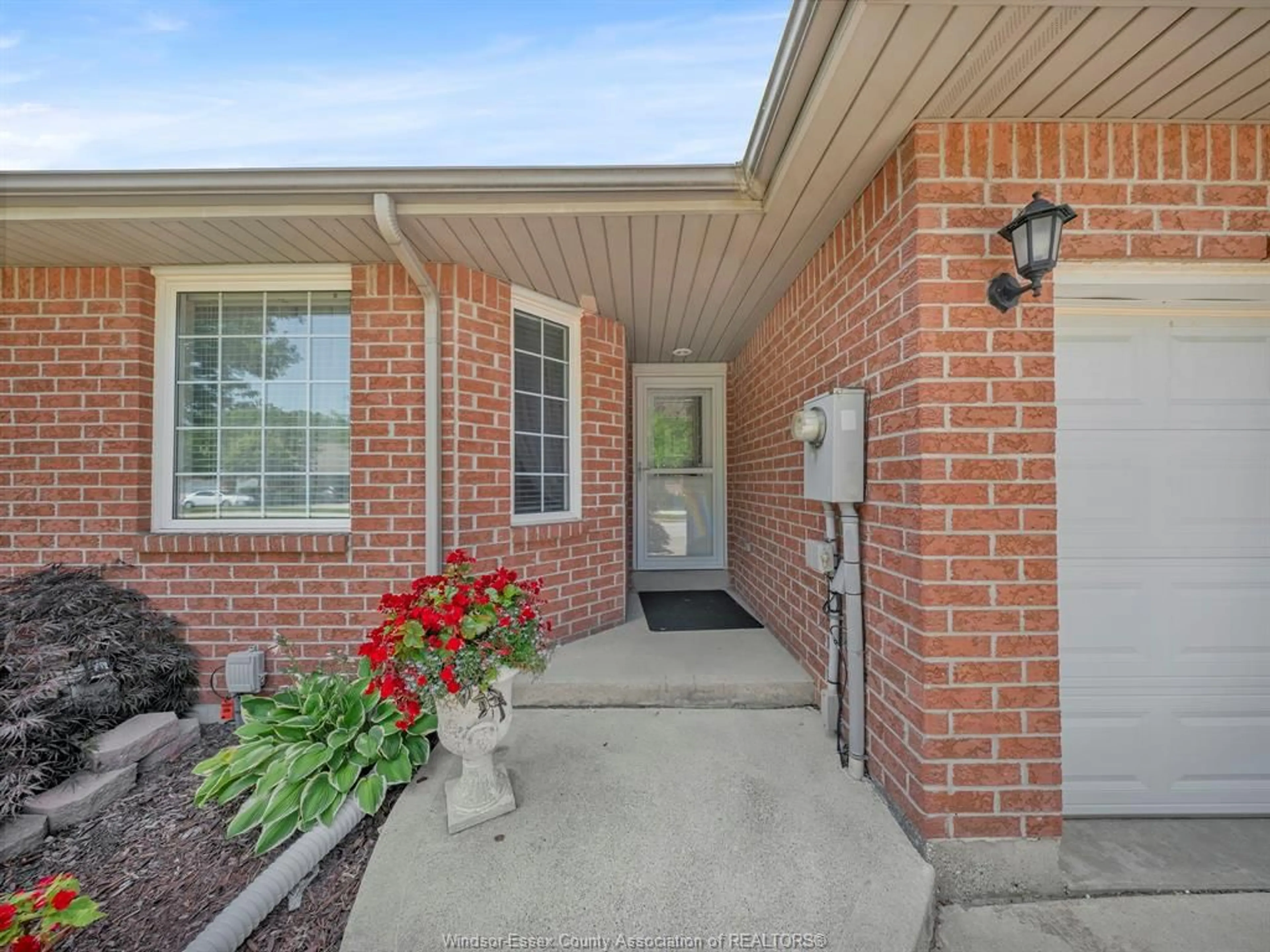 Home with brick exterior material, street for 1921 QUESTA, Windsor Ontario N8P 1M5