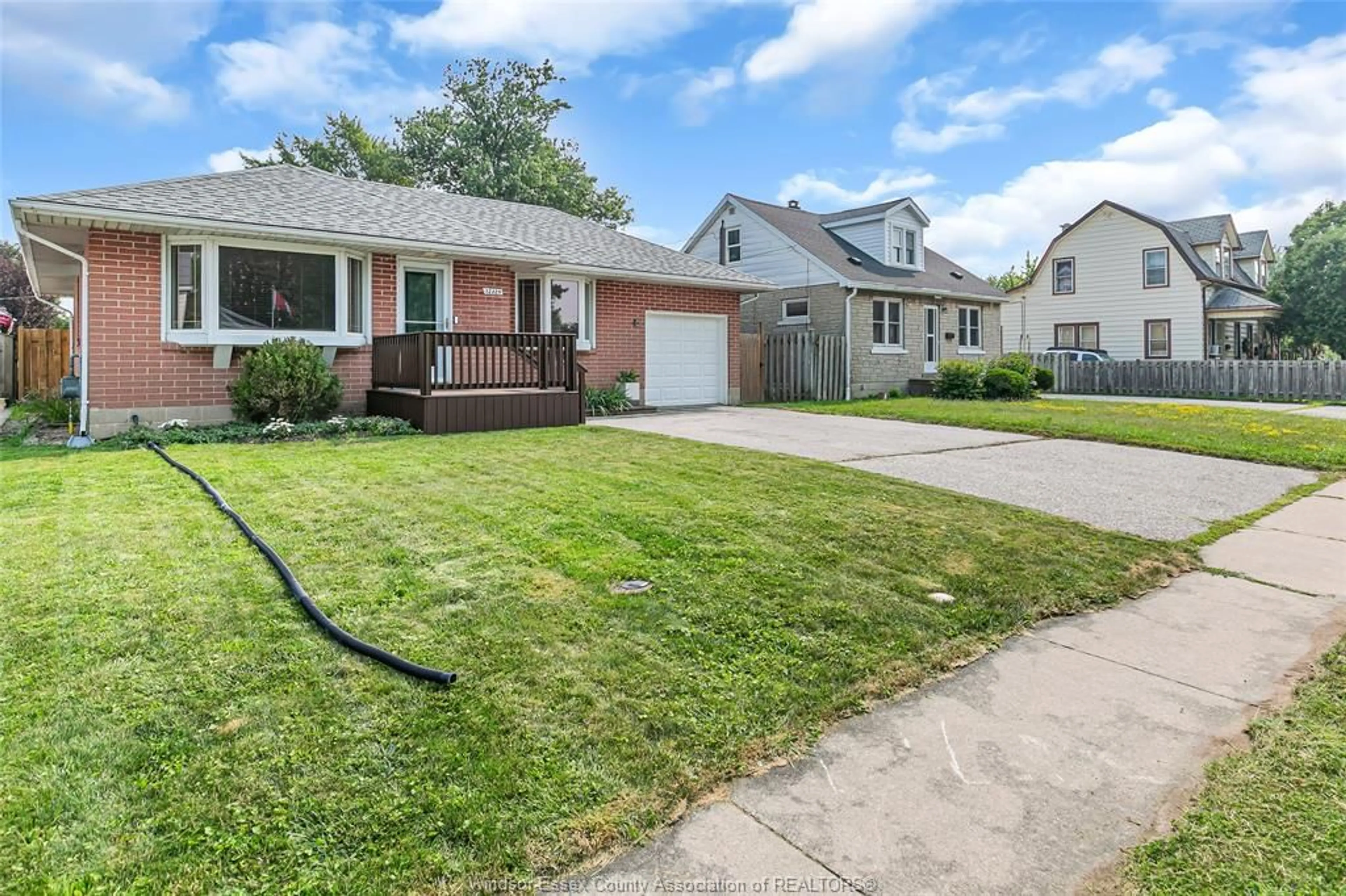 A pic from outside/outdoor area/front of a property/back of a property/a pic from drone, street for 12325 RENAUD St, Tecumseh Ontario N8N 1P5