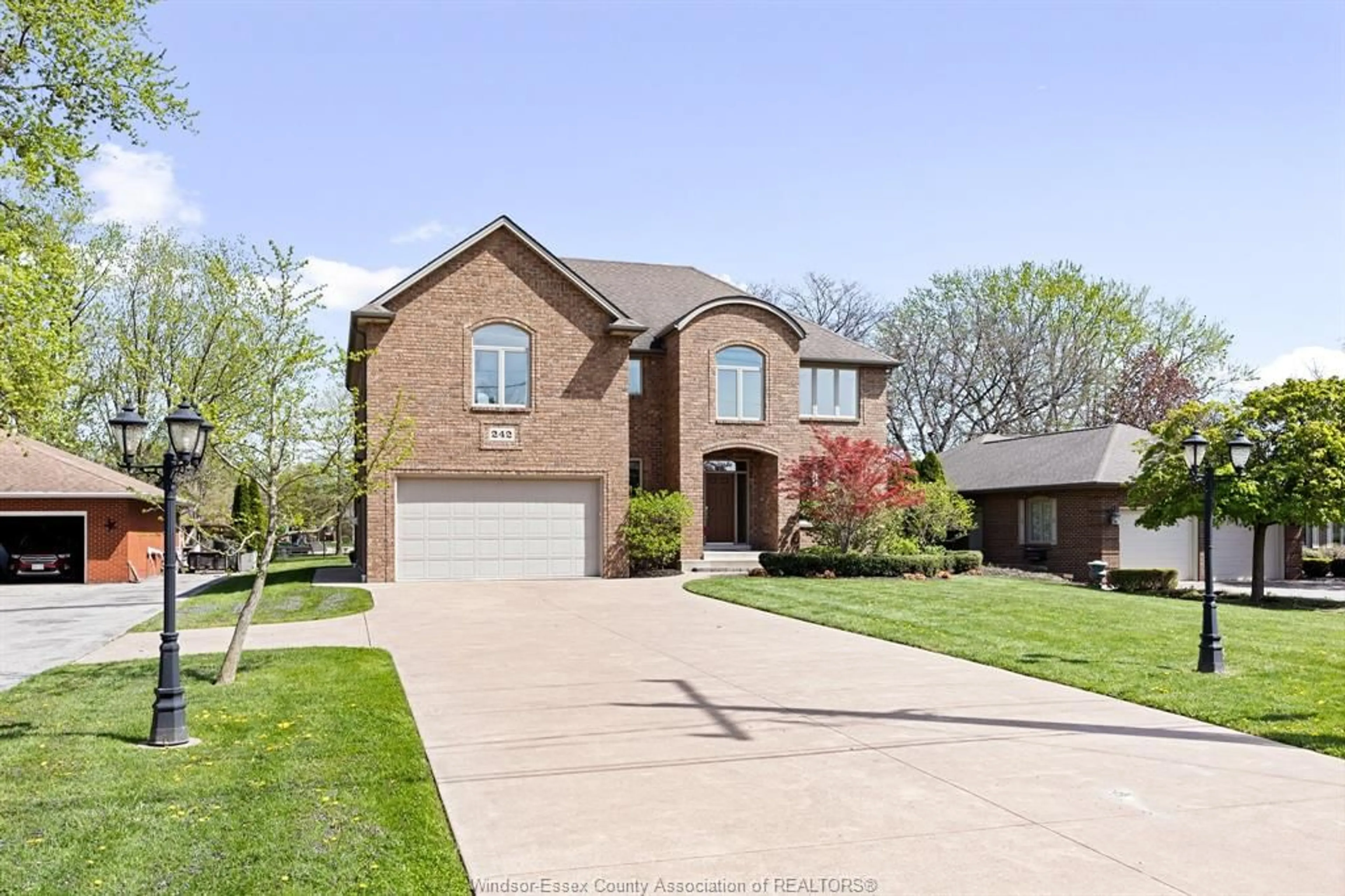 Home with brick exterior material, street for 242 WEST PUCE Rd, Lakeshore Ontario N0R 1A0