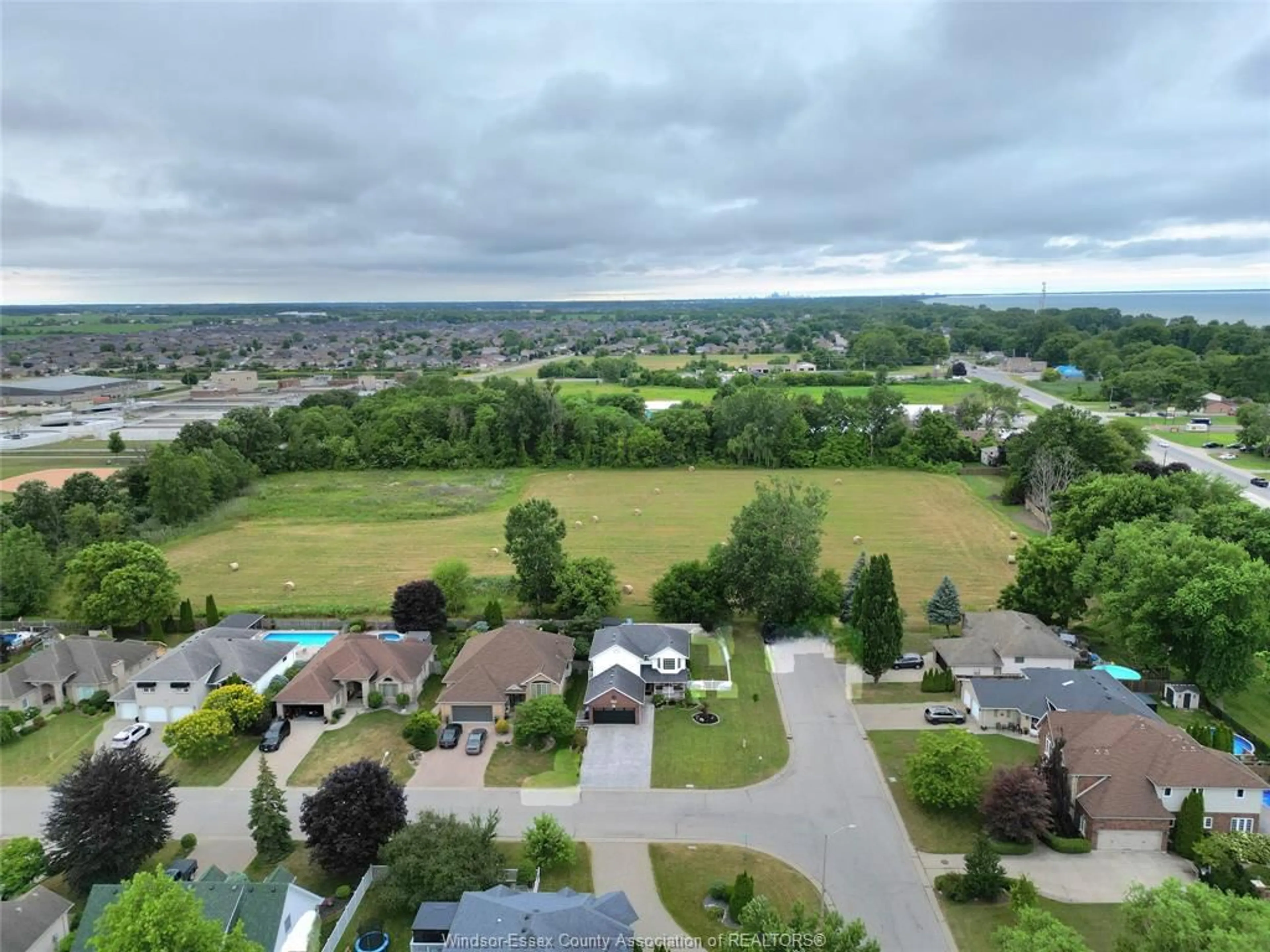A pic from outside/outdoor area/front of a property/back of a property/a pic from drone, mountain view for 211 BAYBERRY, Lakeshore Ontario N0R 1A0