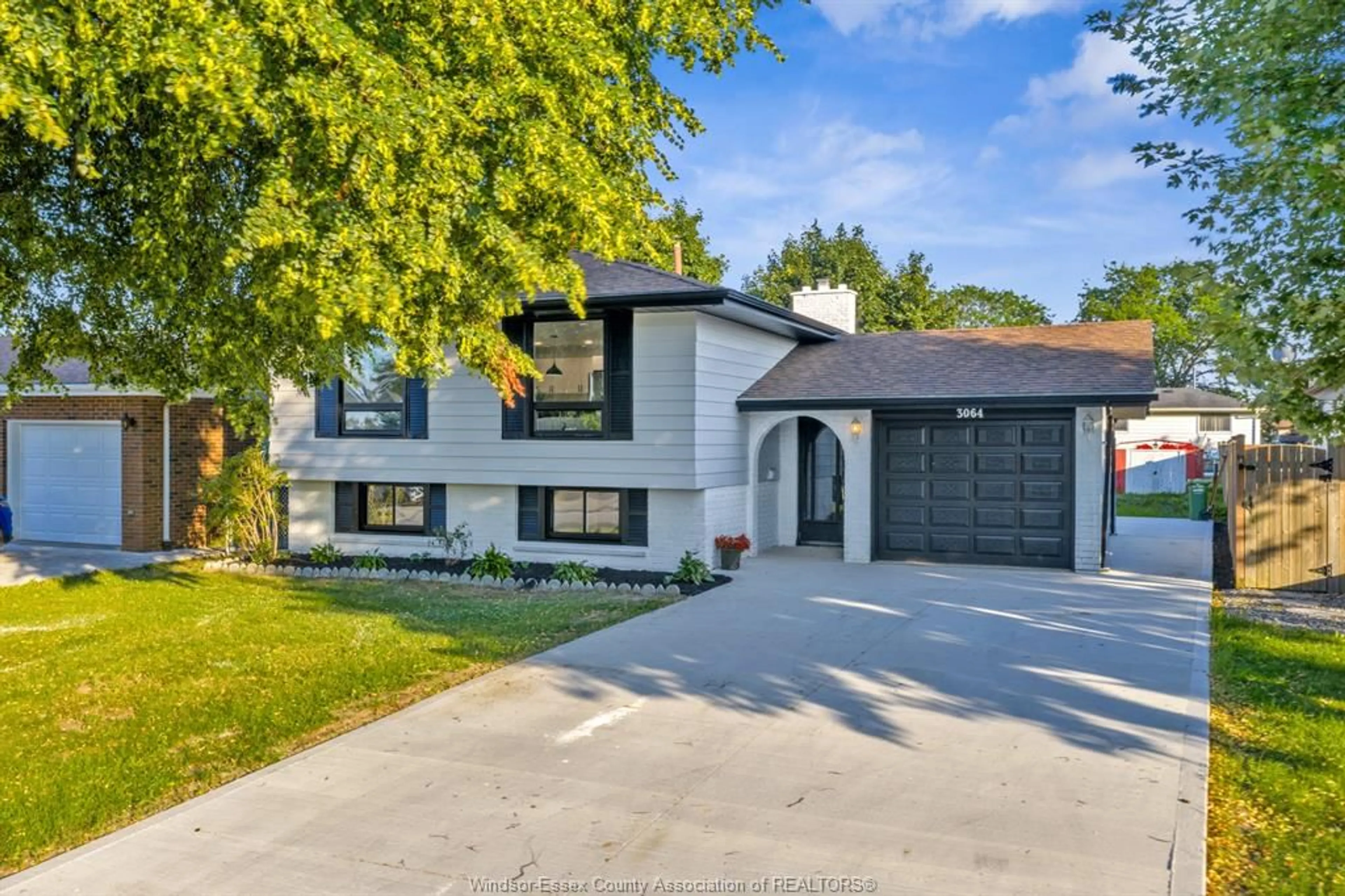 Home with brick exterior material, street for 3064 RUSHTON Dr, Windsor Ontario N8R 1M4