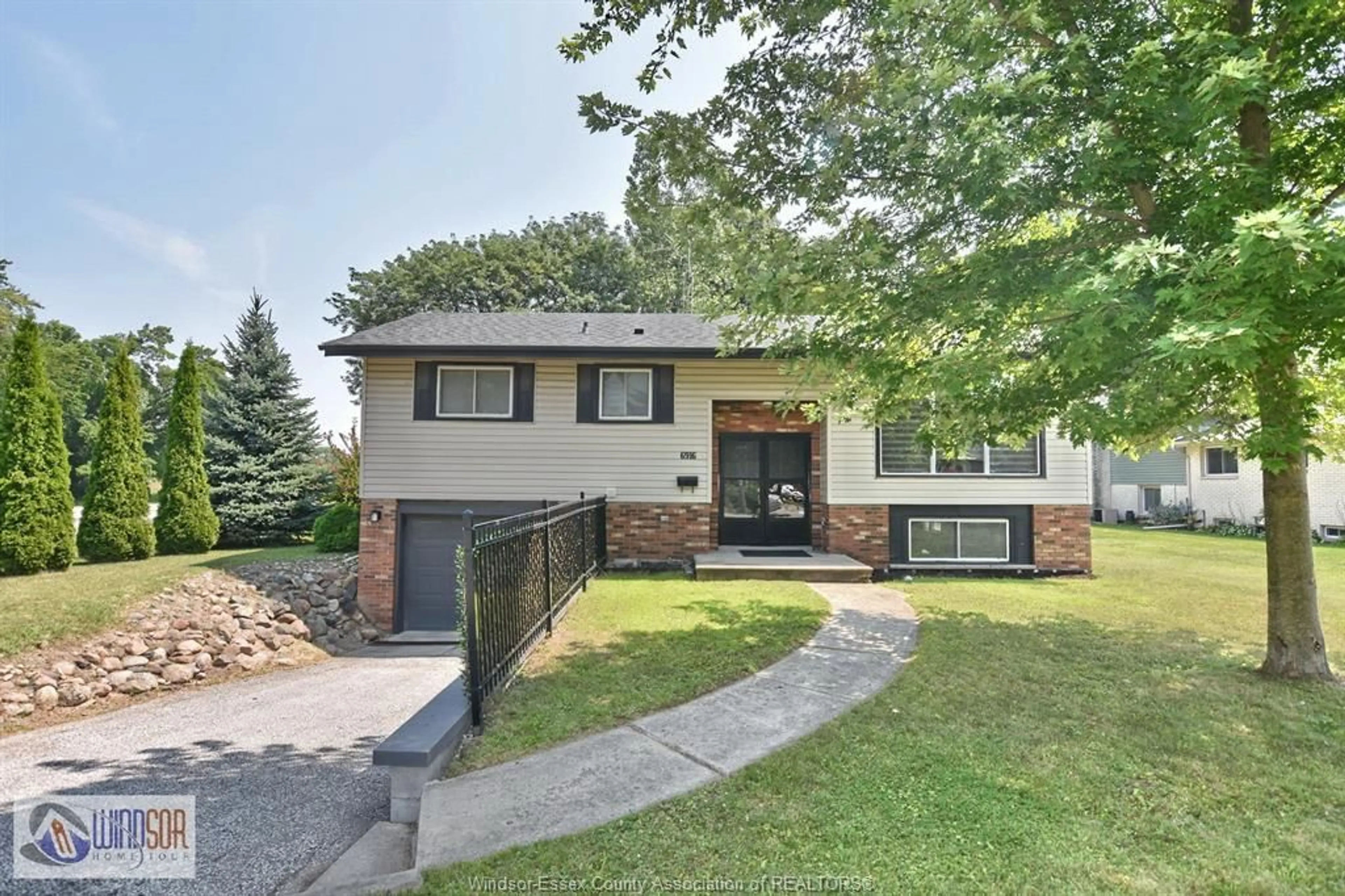 Home with brick exterior material, street for 6916 MALDEN Rd, LaSalle Ontario N9J 2T5