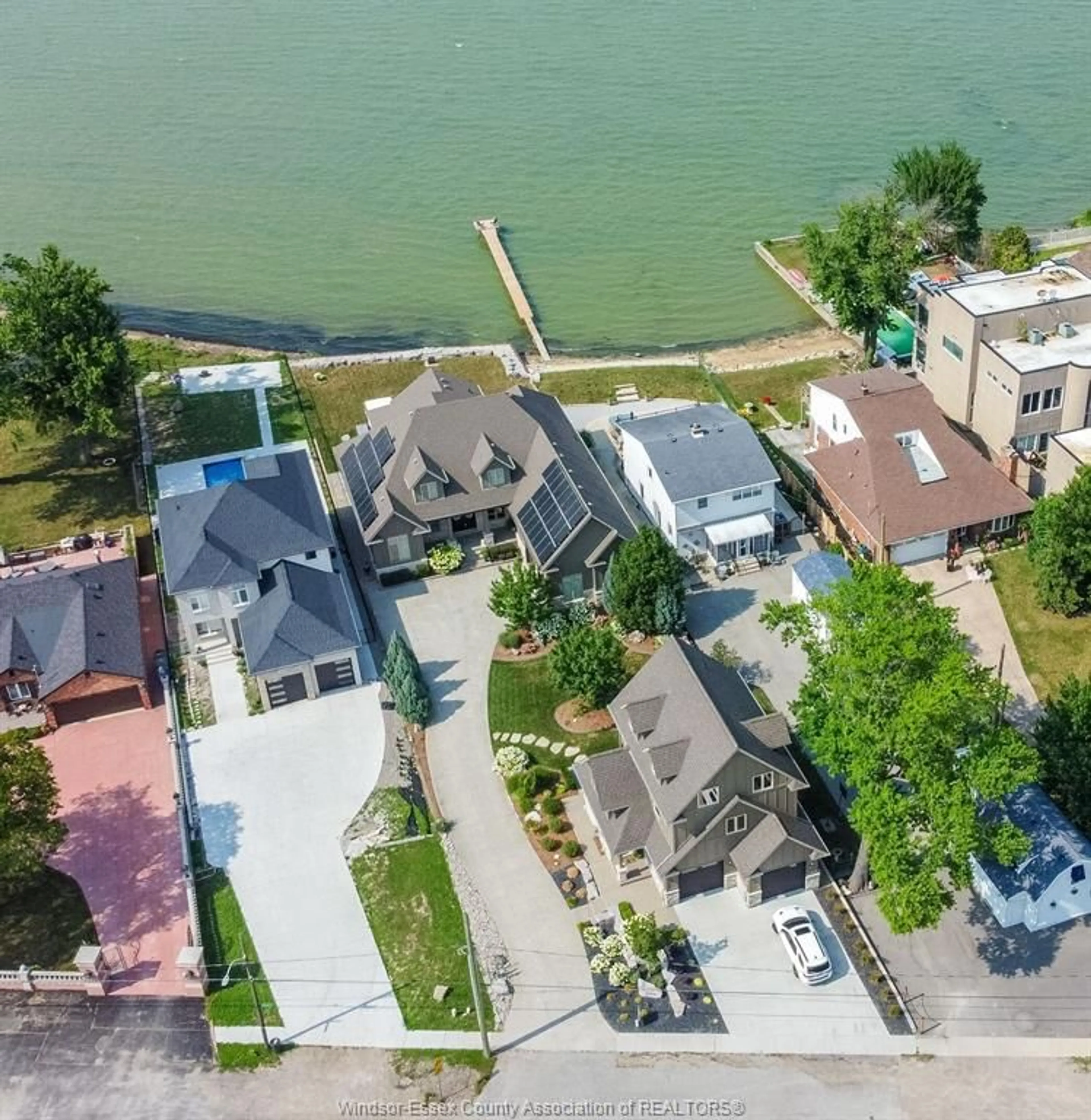 A pic from outside/outdoor area/front of a property/back of a property/a pic from drone, water/lake/river/ocean view for 12082 & 12078 RIVERSIDE Dr, Tecumseh Ontario N8P 1A9