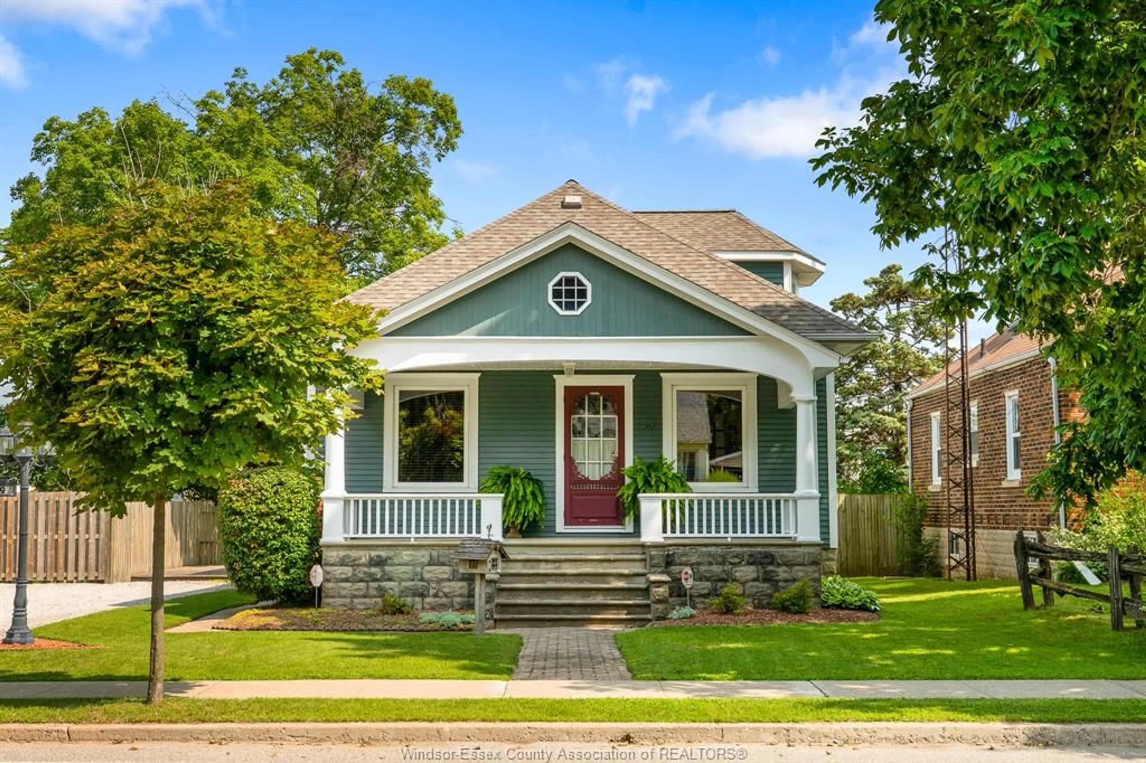 Home with vinyl exterior material, street for 39 Georgia Ave, Leamington Ontario N8H 2E8