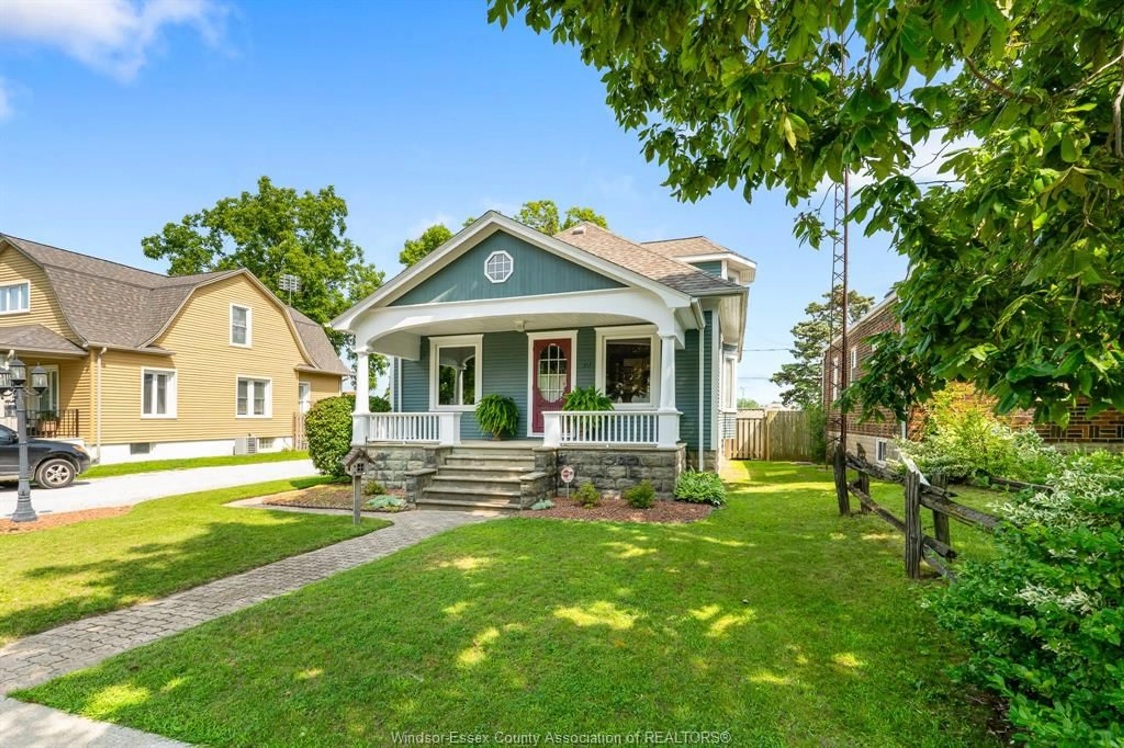 Home with vinyl exterior material, street for 39 Georgia Ave, Leamington Ontario N8H 2E8