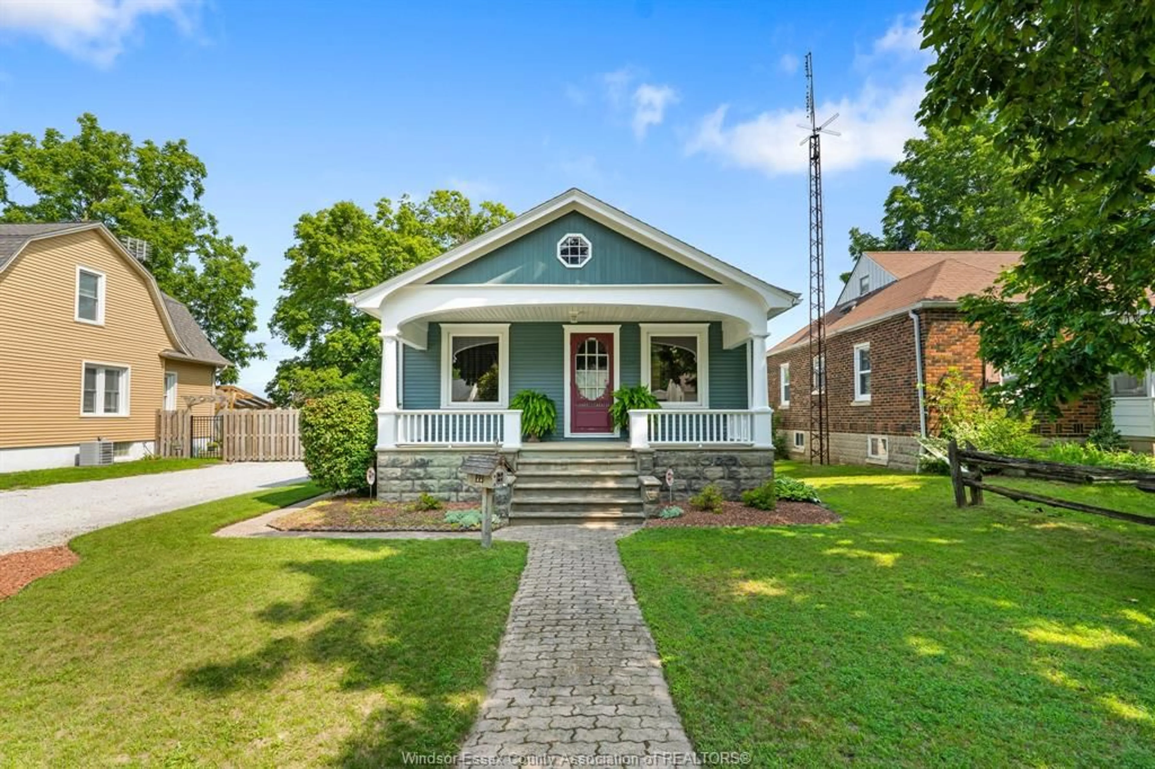 Home with brick exterior material, street for 39 Georgia Ave, Leamington Ontario N8H 2E8