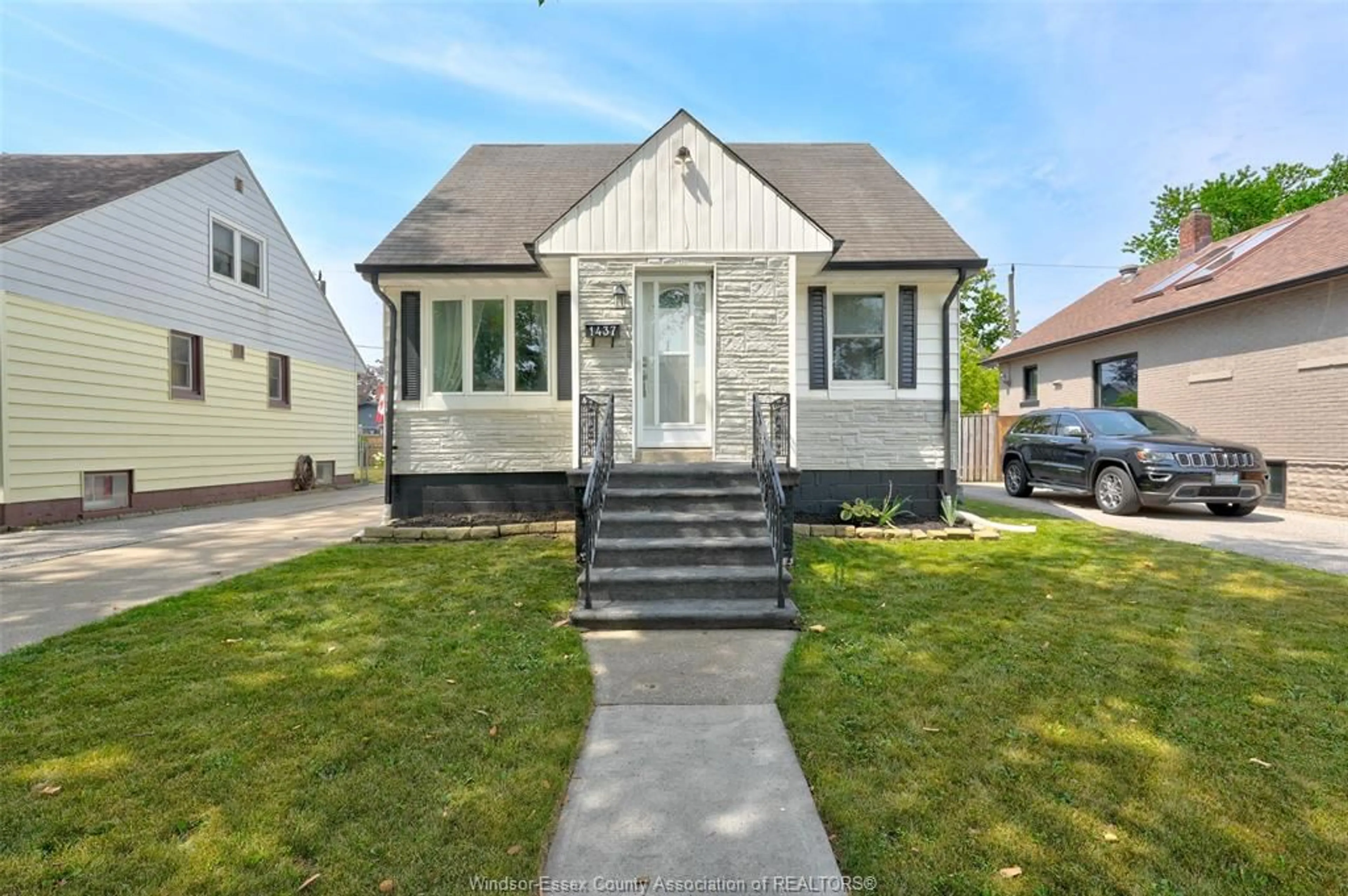 Home with vinyl exterior material, street for 1437 PILLETTE, Windsor Ontario N8Y 3C1