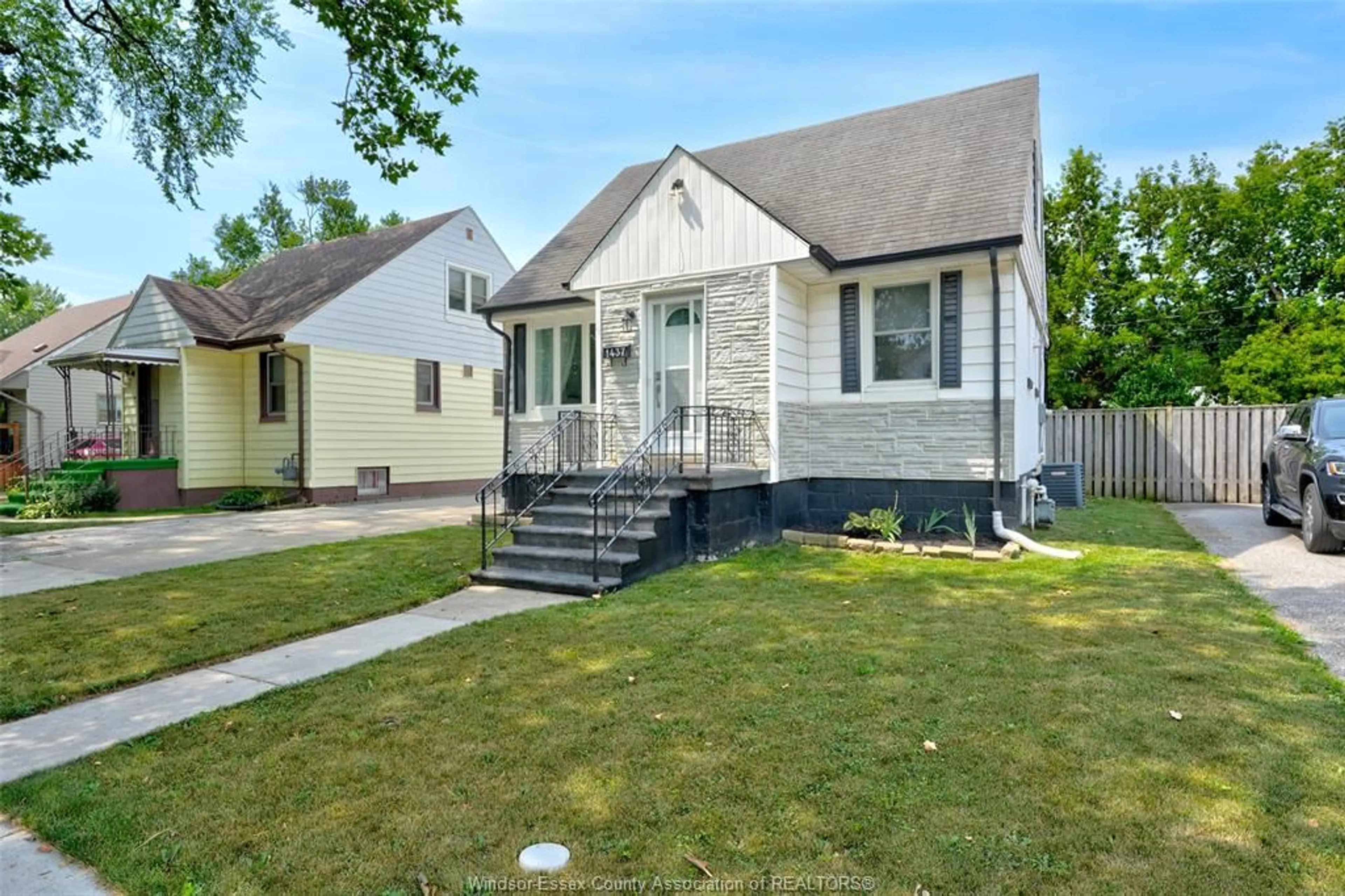 Home with vinyl exterior material, street for 1437 PILLETTE, Windsor Ontario N8Y 3C1