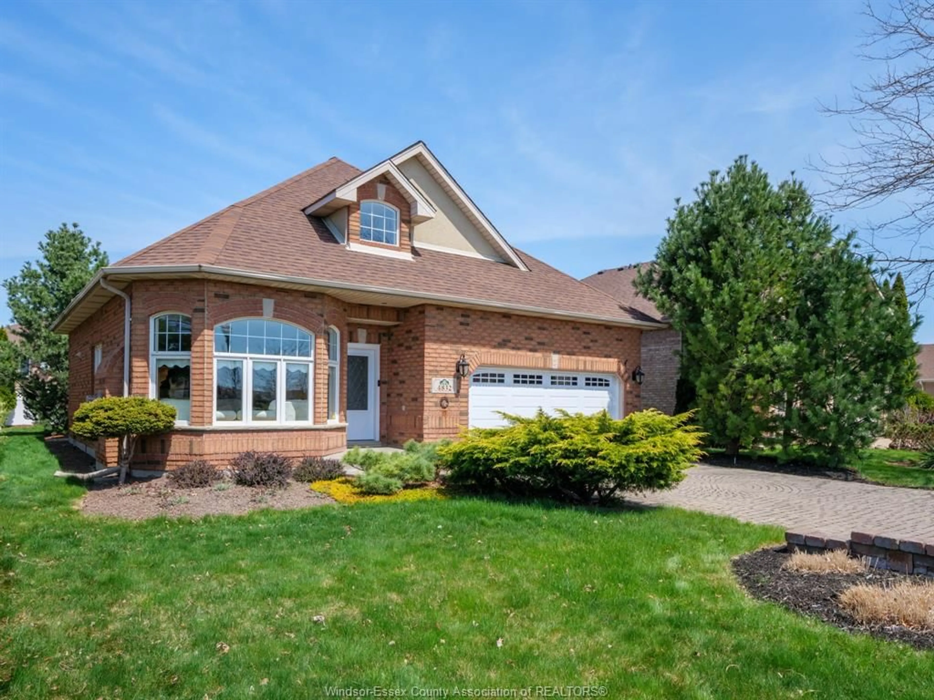 Home with brick exterior material, street for 4832 SOUTHWOOD LAKES Blvd, Windsor Ontario N9G 2T2
