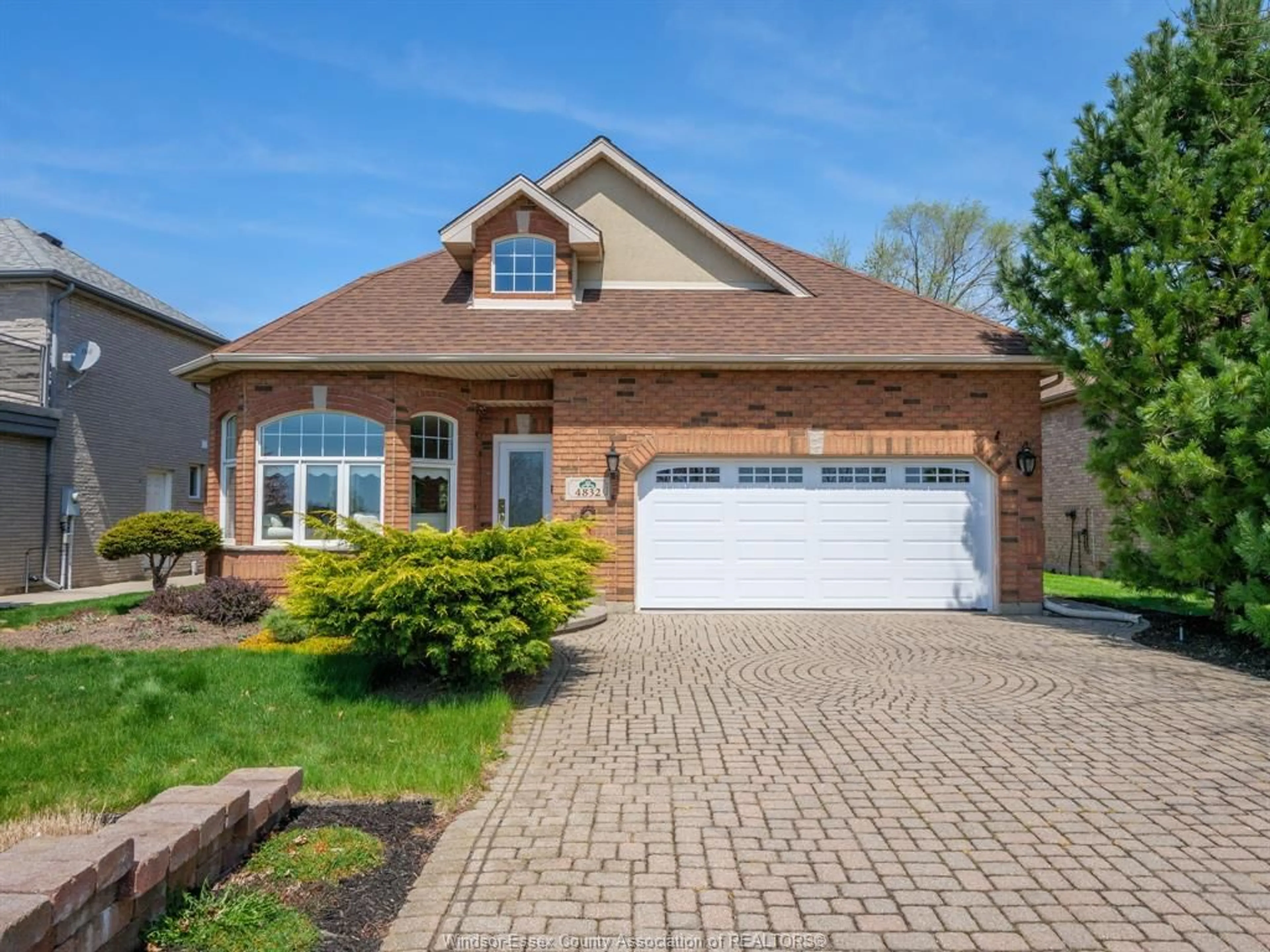 Home with brick exterior material, street for 4832 SOUTHWOOD LAKES Blvd, Windsor Ontario N9G 2T2