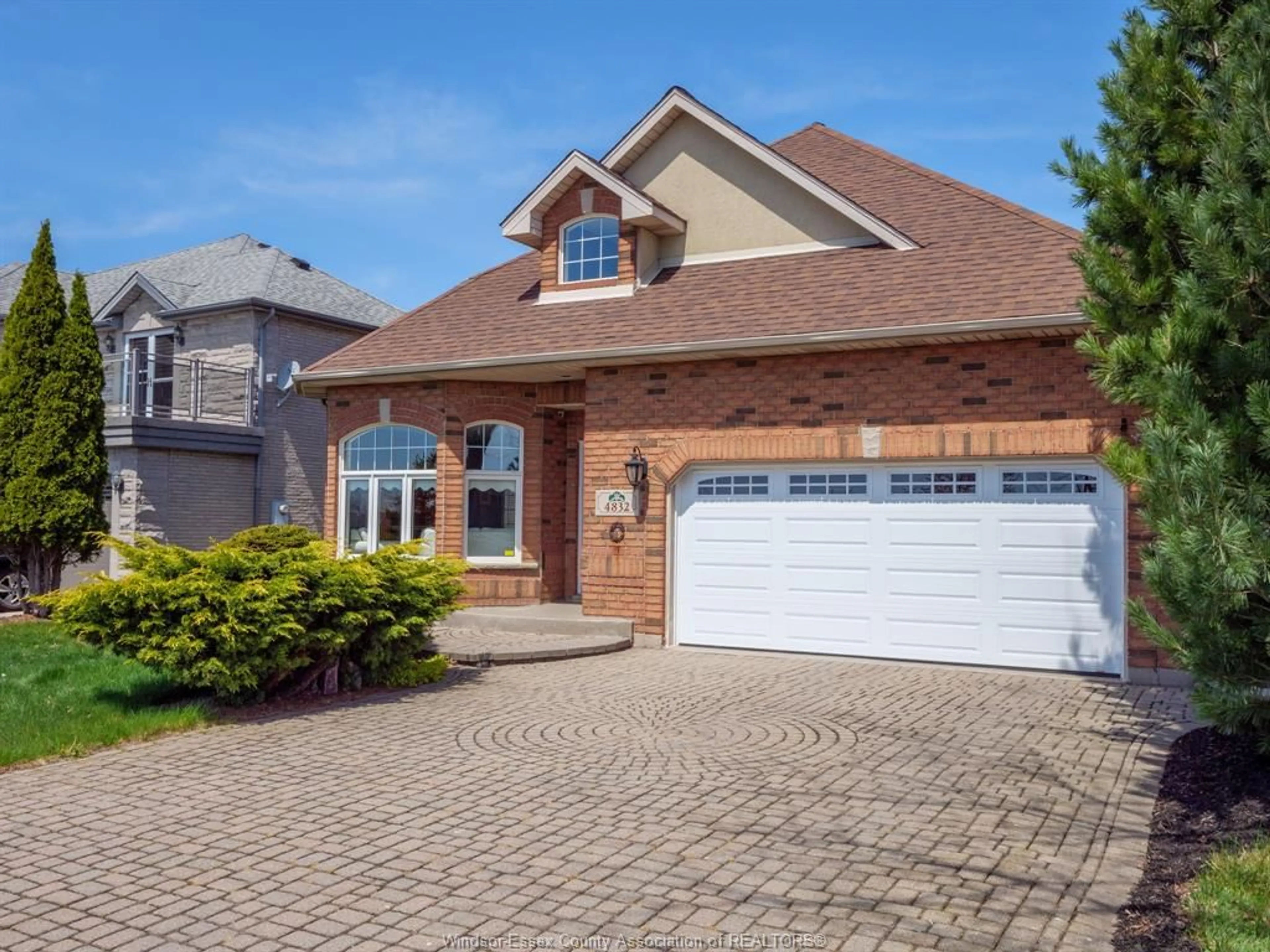 Home with brick exterior material, street for 4832 SOUTHWOOD LAKES Blvd, Windsor Ontario N9G 2T2