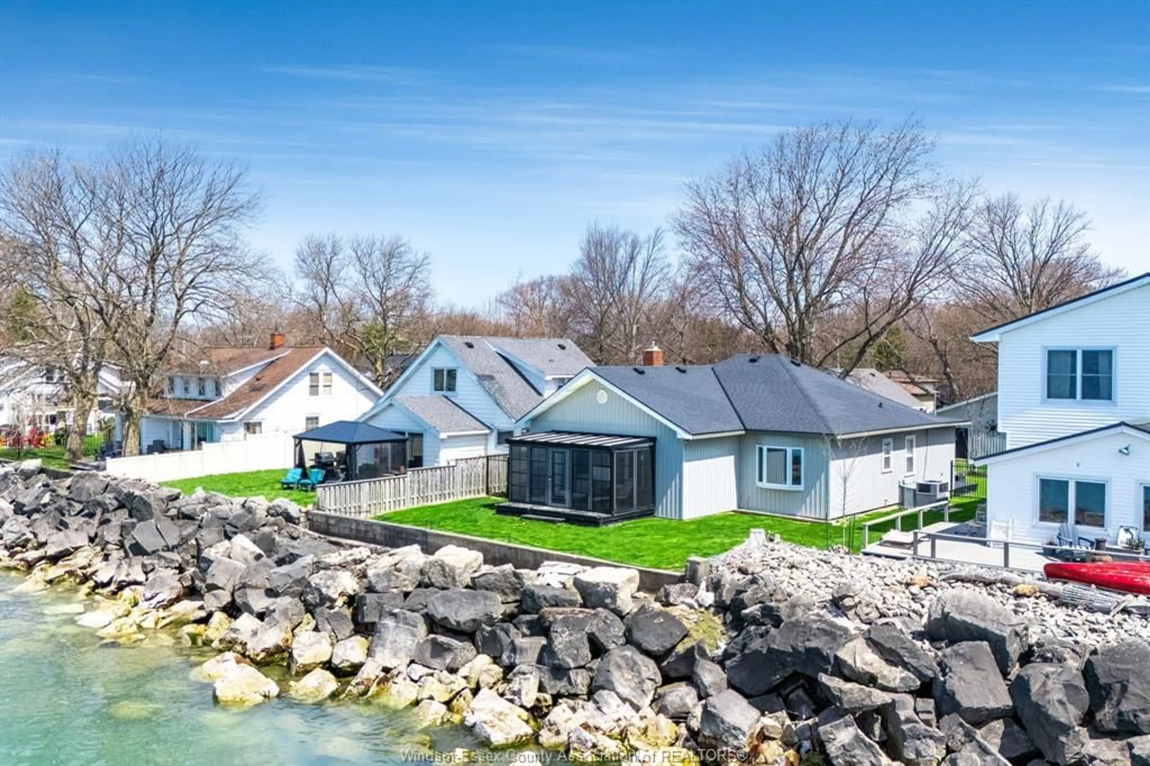 A pic from outside/outdoor area/front of a property/back of a property/a pic from drone, water/lake/river/ocean view for 360 ROBSON Rd, Leamington Ontario N8H 0A5