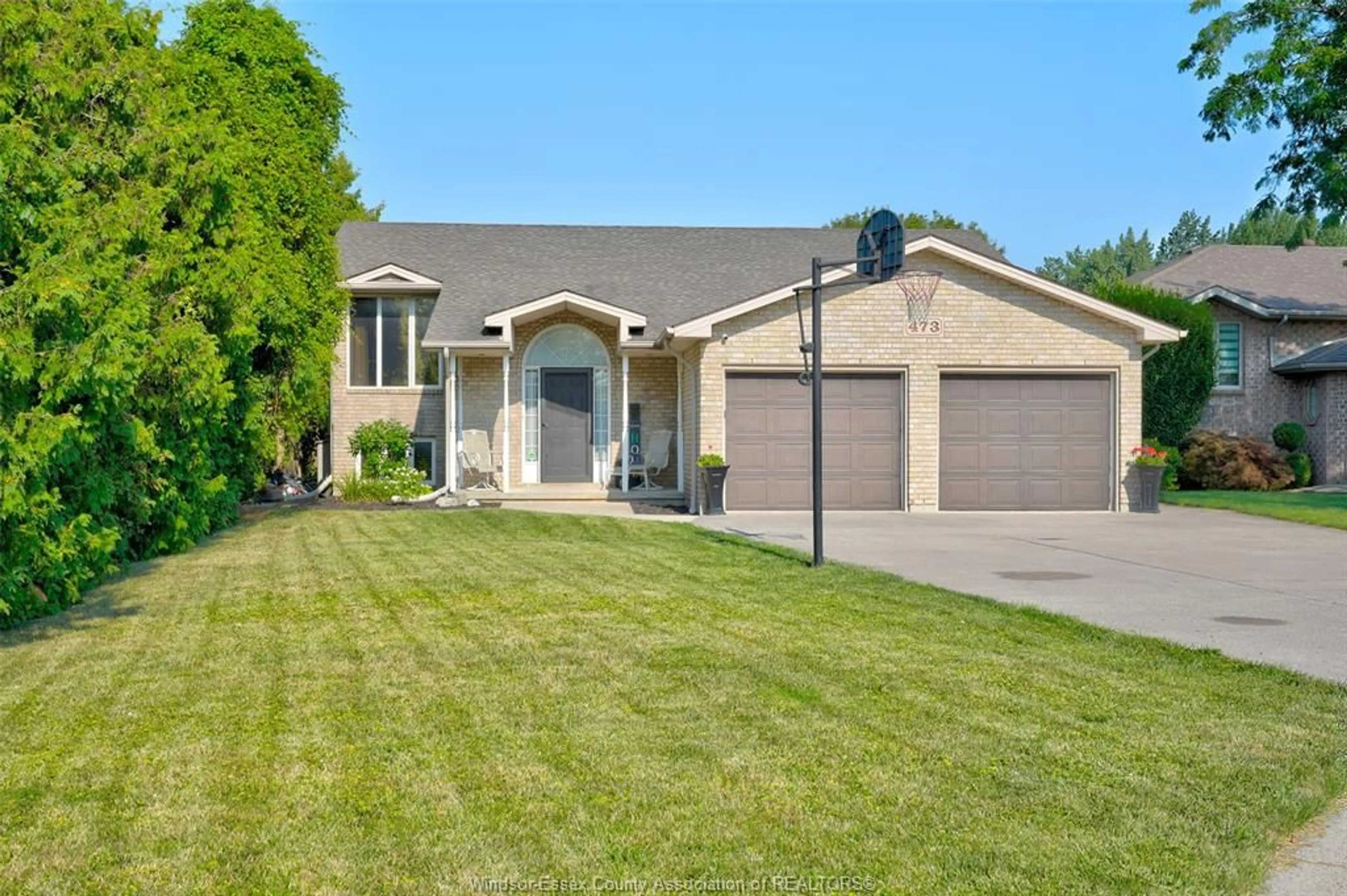 Home with vinyl exterior material, street for 473 CHAMPLAIN, Belle River Ontario N8L 0L2