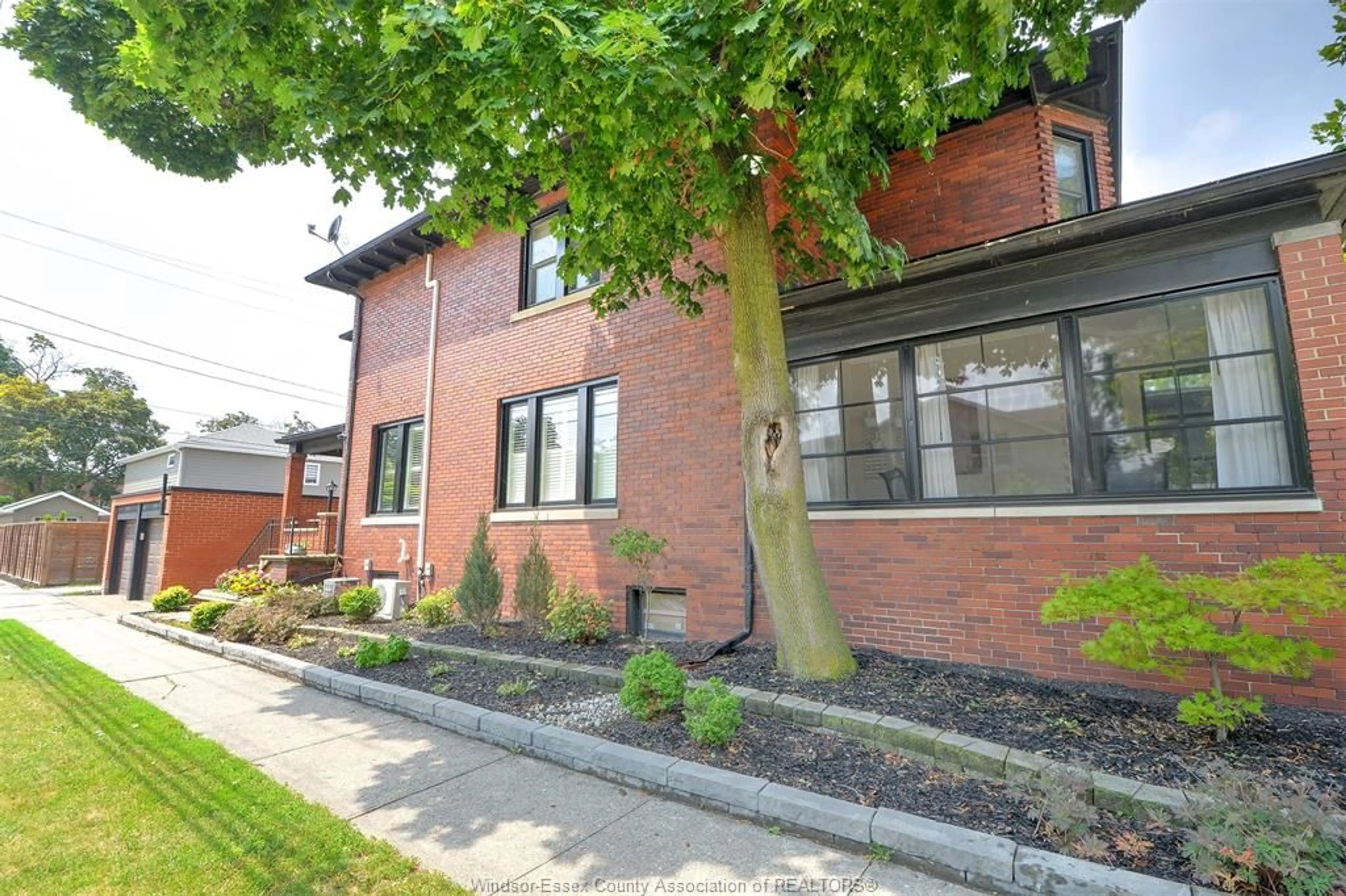 Home with brick exterior material, street for 1097 CHILVER Rd, Windsor Ontario N8Y 2K6