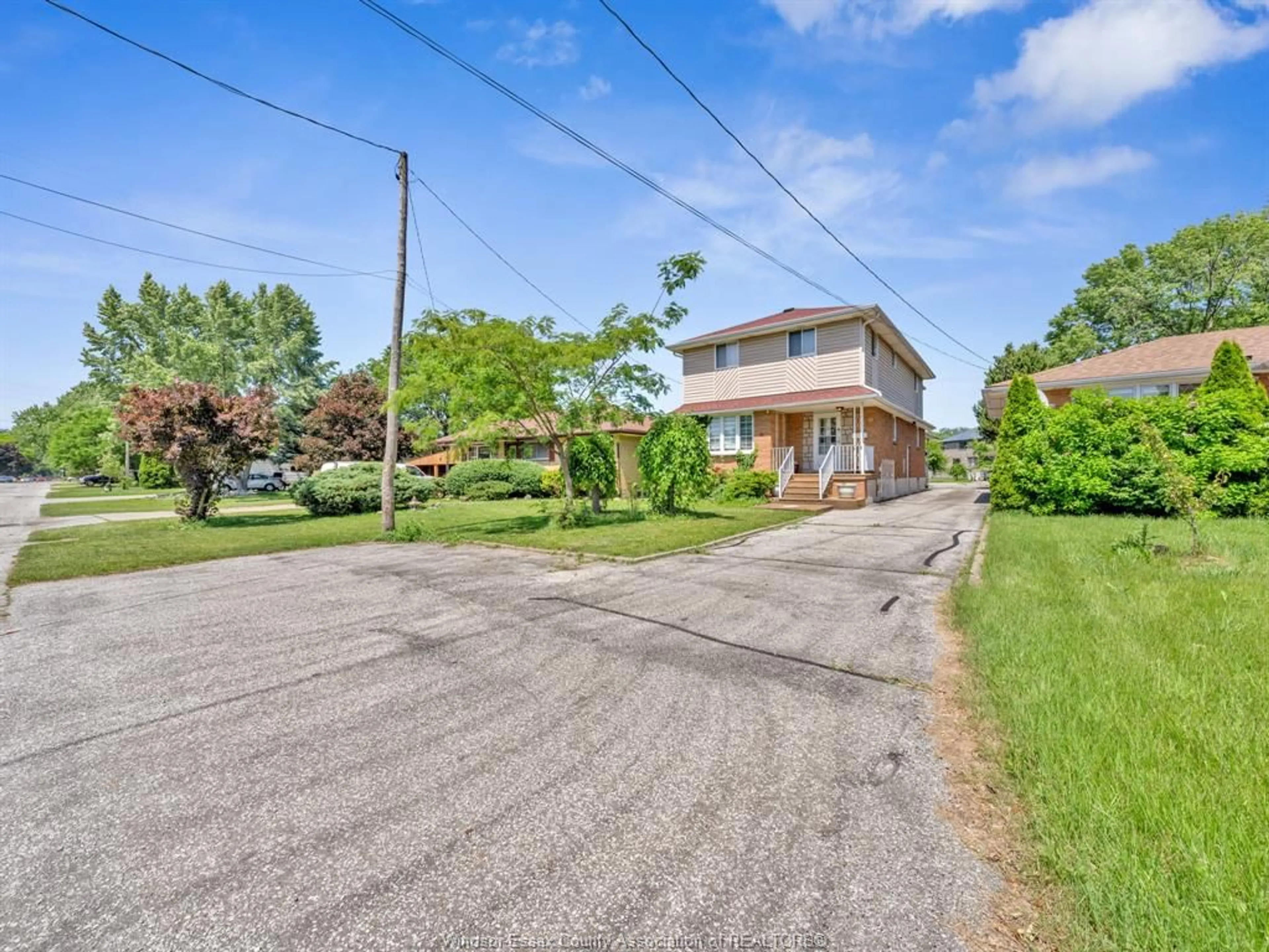 A pic from outside/outdoor area/front of a property/back of a property/a pic from drone, street for 2690 TOURANGEAU Rd, Windsor Ontario N8W 4P3
