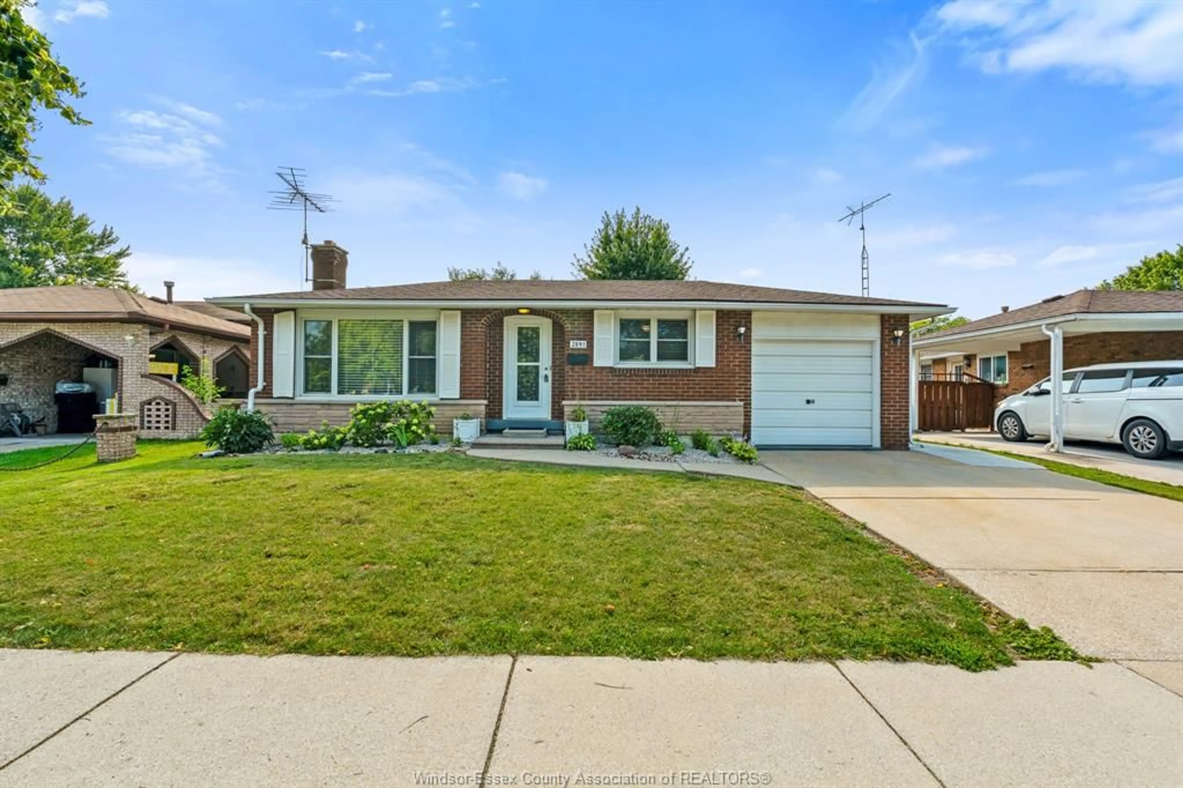 Home with brick exterior material, street for 2891 FOREST GLADE Dr, Windsor Ontario N8R 1L4
