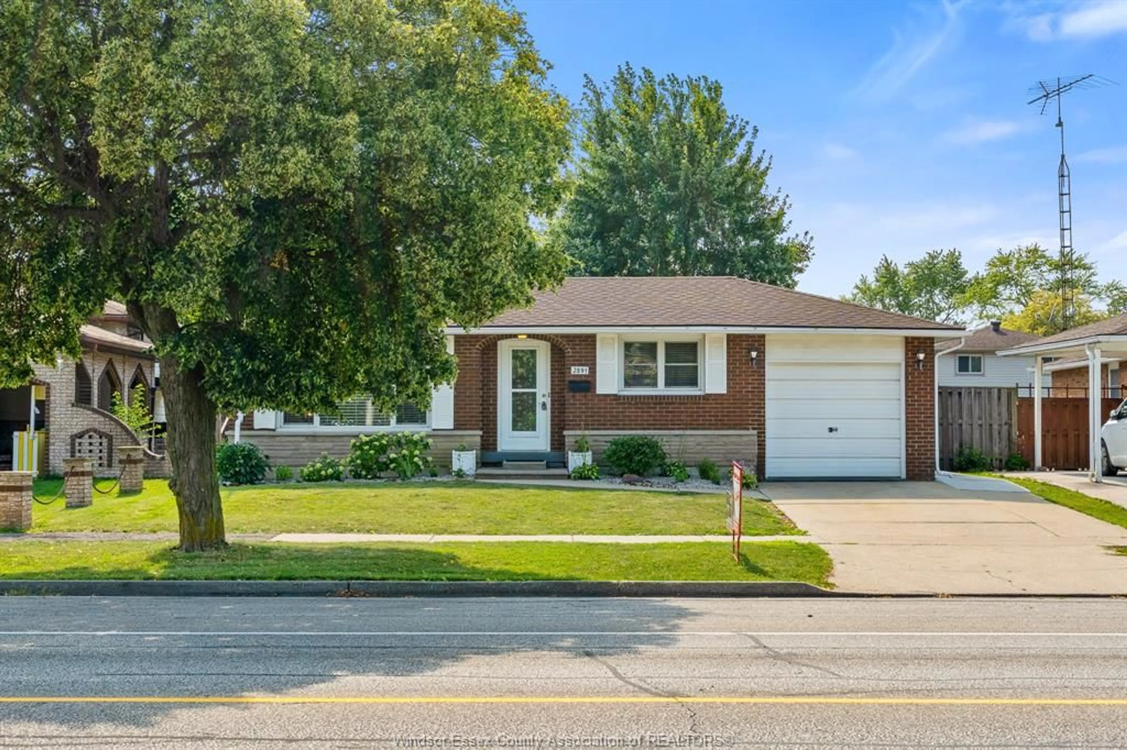 Home with vinyl exterior material, street for 2891 FOREST GLADE Dr, Windsor Ontario N8R 1L4