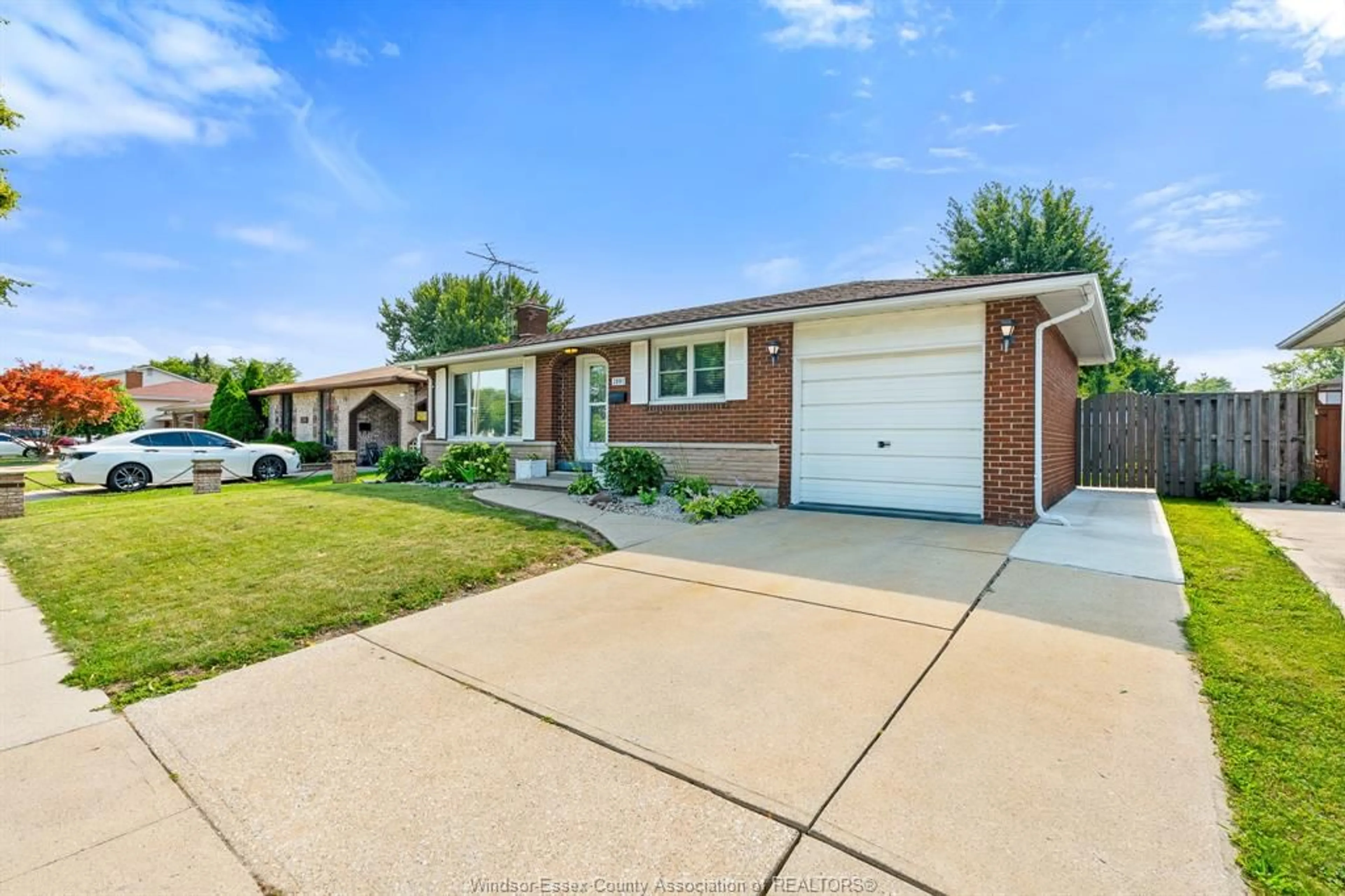 Home with brick exterior material, street for 2891 FOREST GLADE Dr, Windsor Ontario N8R 1L4