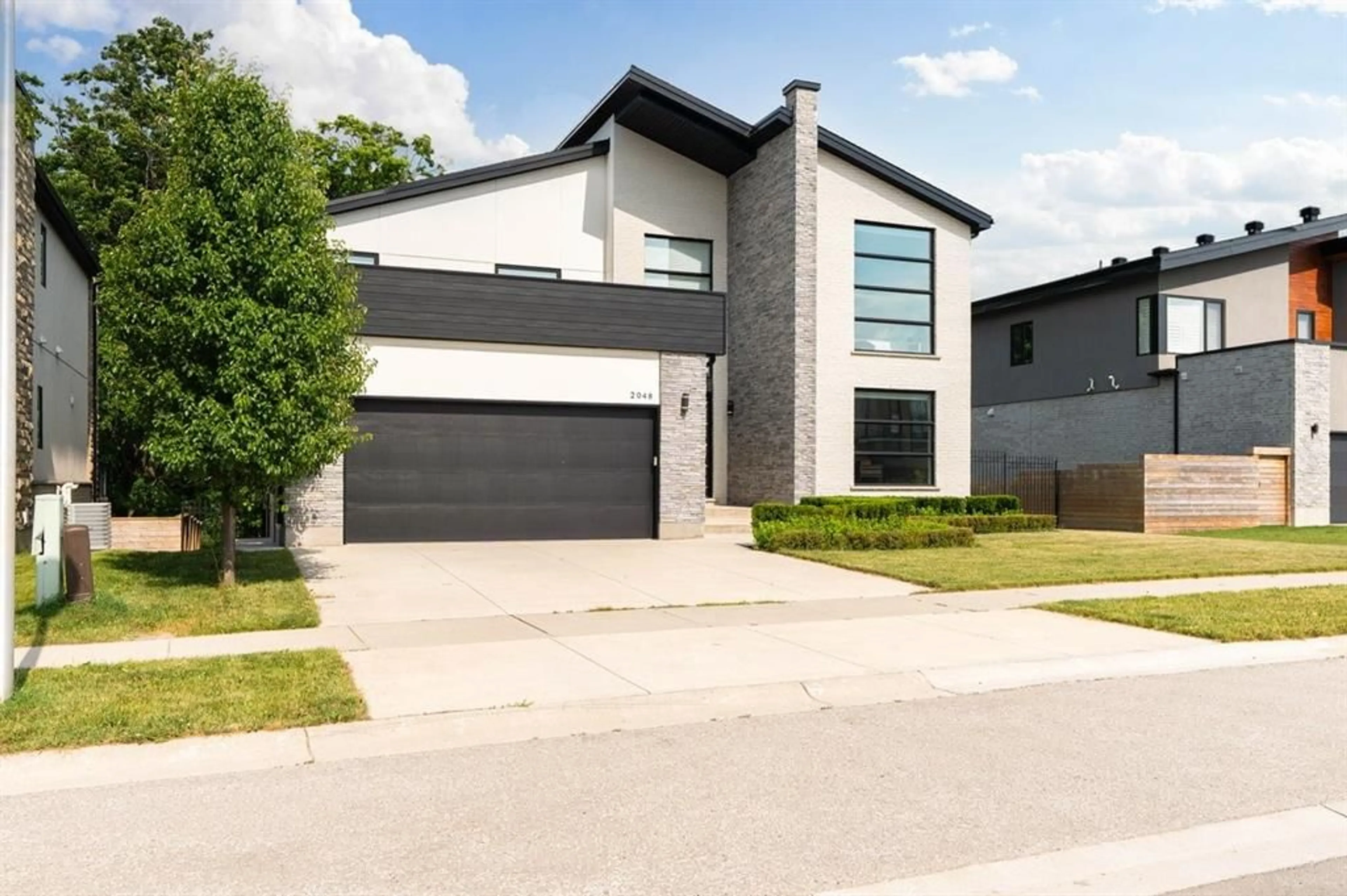 Home with brick exterior material, street for 2048 IRONWOOD Rd, London Ontario N6K 0H8