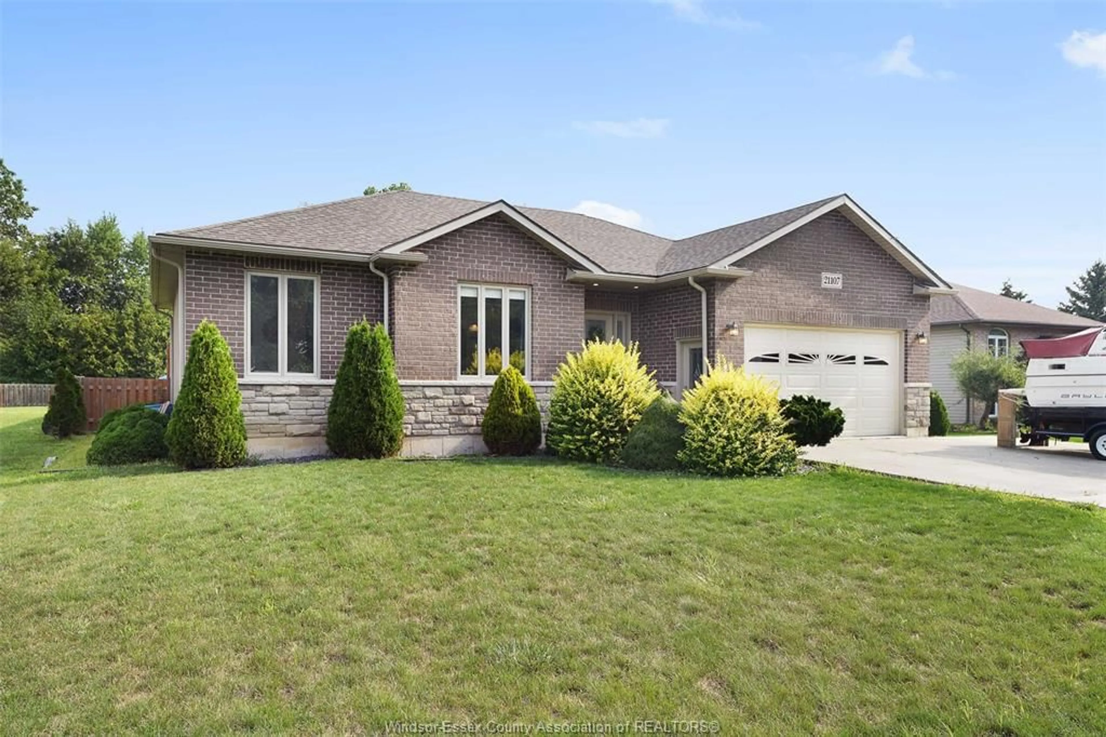 Home with vinyl exterior material, street for 21107 MCLEAN Rd, Wheatley Ontario N0P 2P0