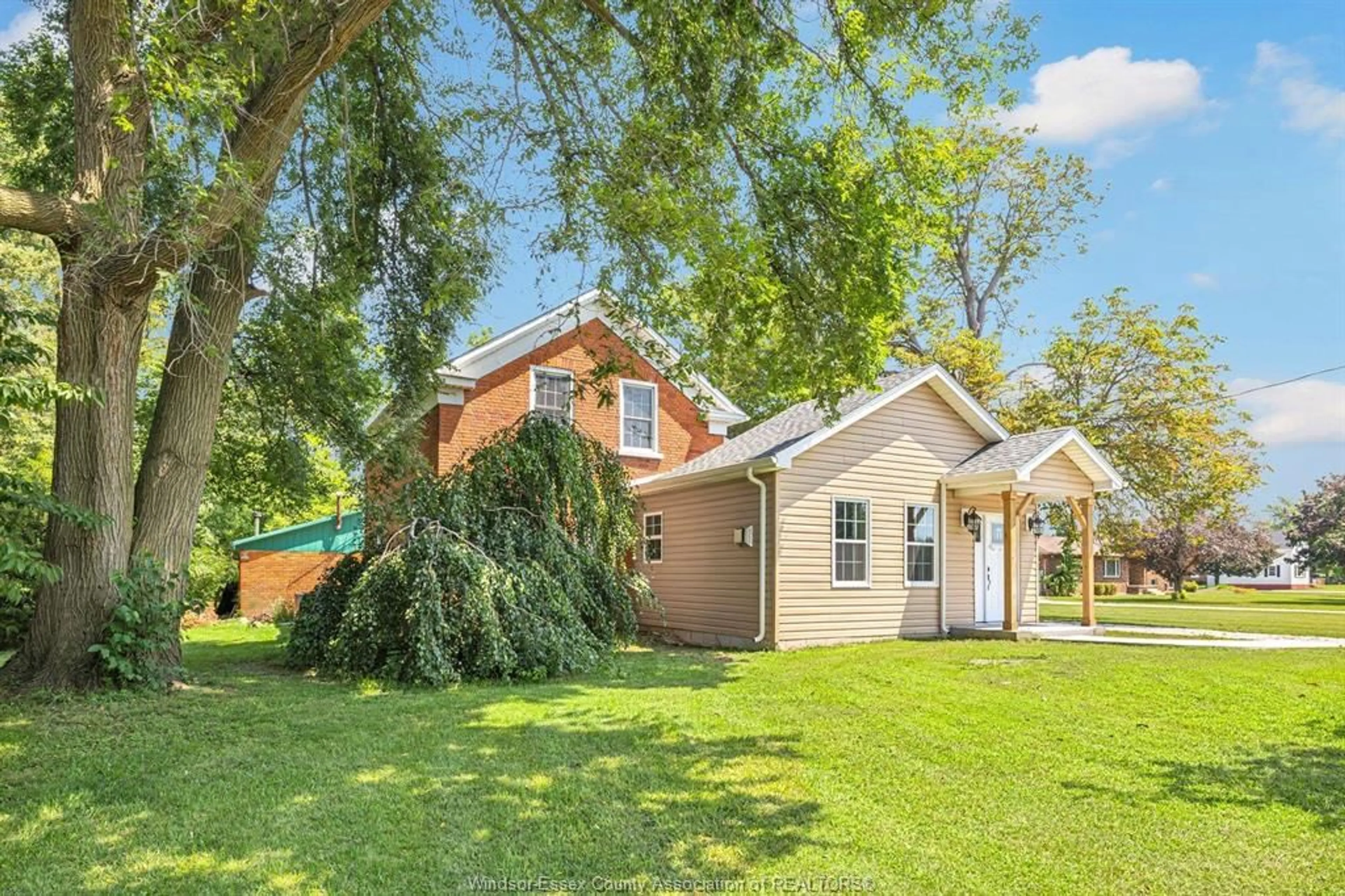 A pic from outside/outdoor area/front of a property/back of a property/a pic from drone, street for 458 COUNTY RD 34, Cottam Ontario N8M 2X5