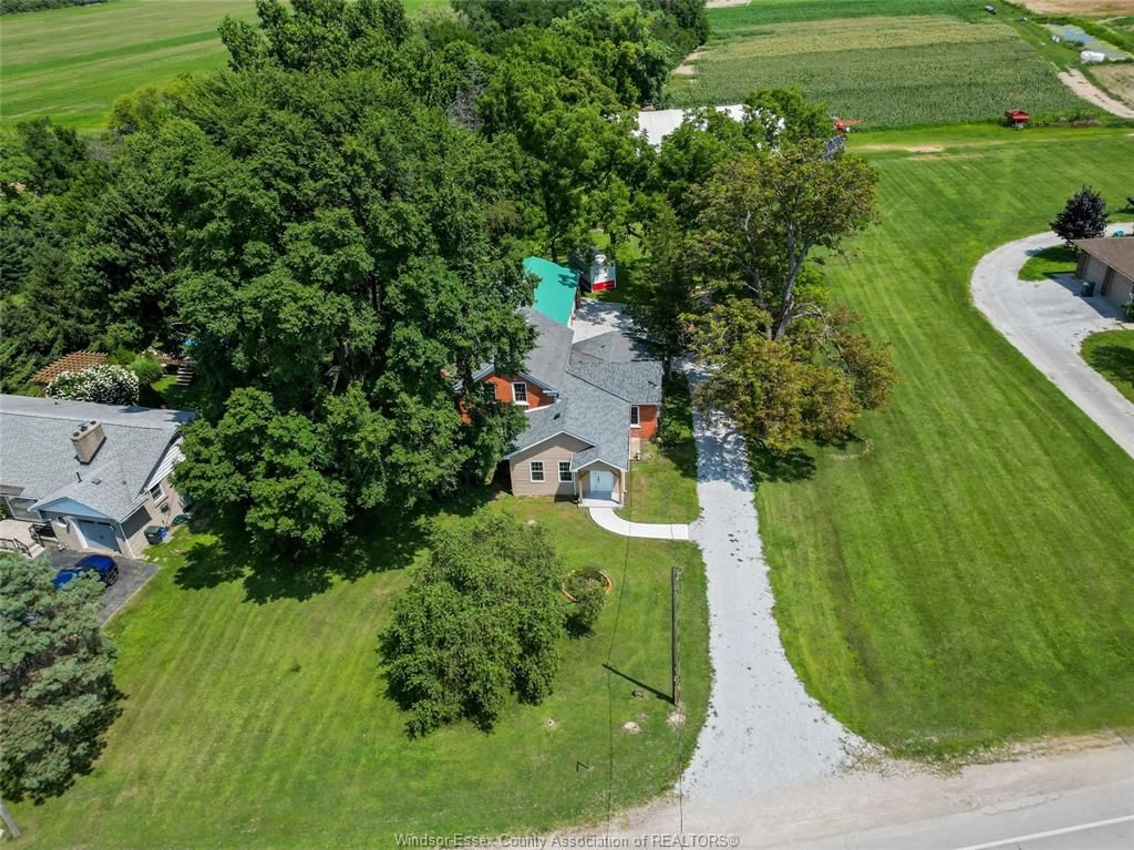 A pic from outside/outdoor area/front of a property/back of a property/a pic from drone, water/lake/river/ocean view for 458 COUNTY RD 34, Cottam Ontario N8M 2X5