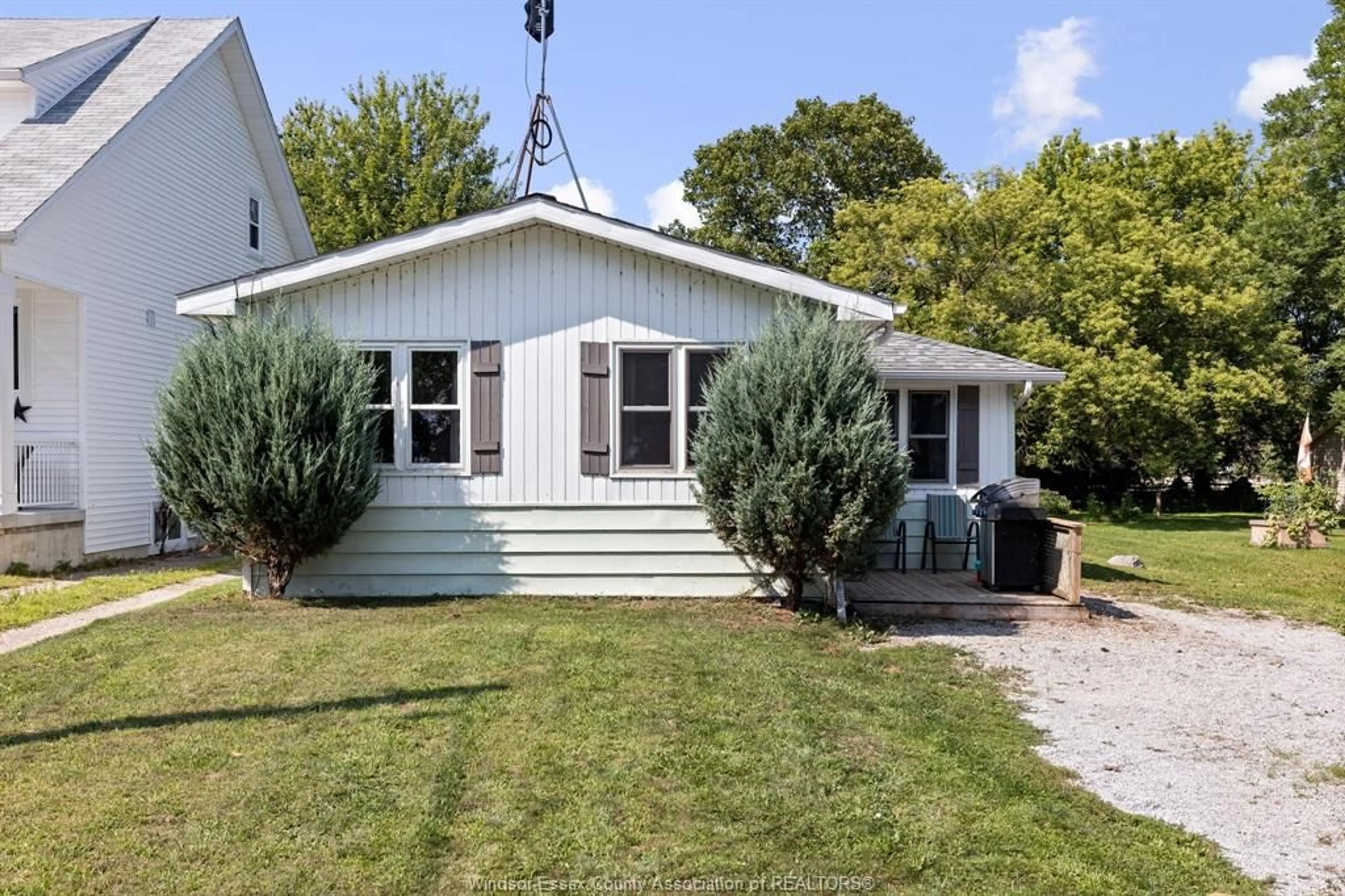 Home with vinyl exterior material, street for 976 WATERS BEACH, Harrow Ontario N0R 1G0