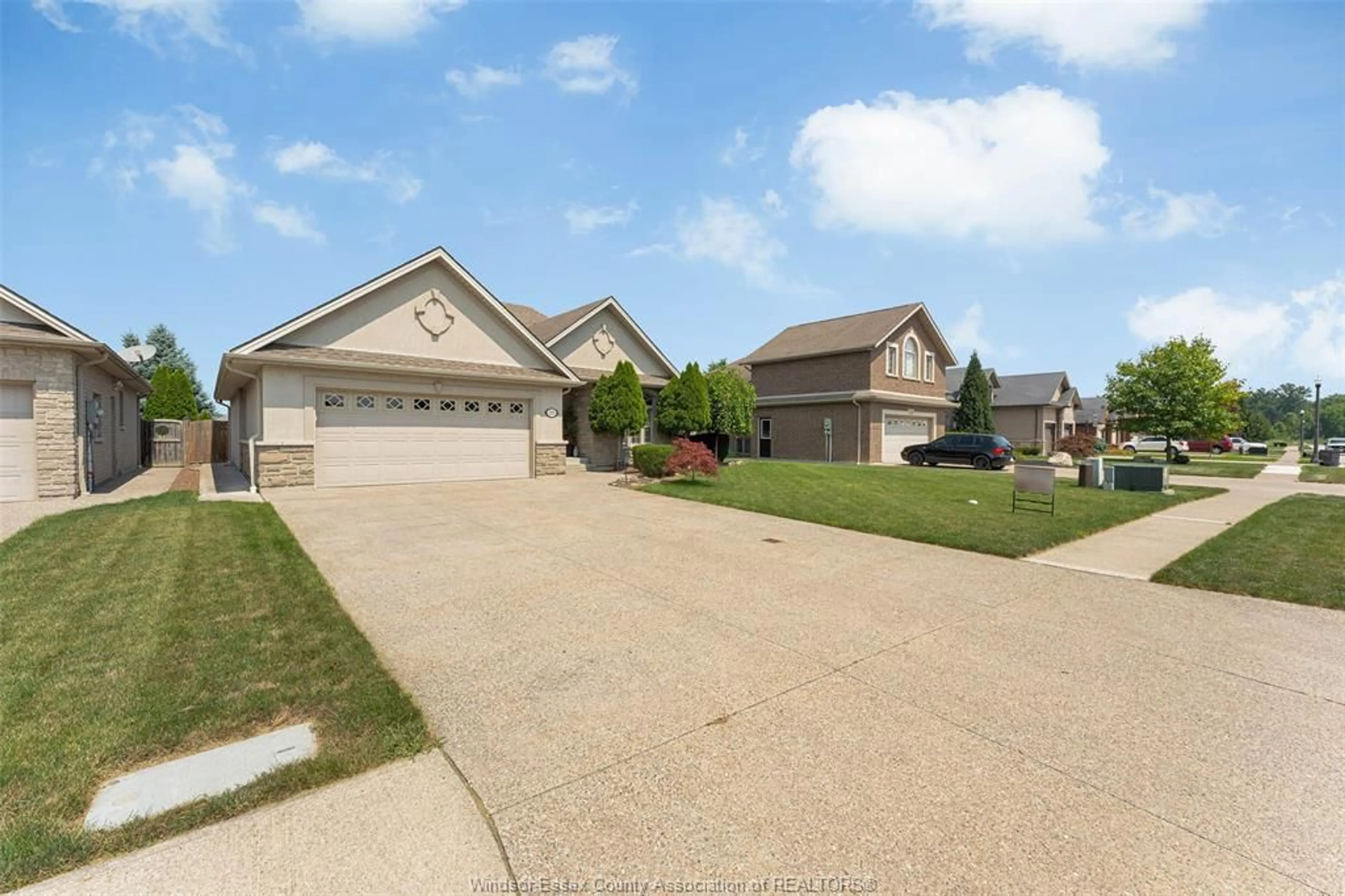 A pic from outside/outdoor area/front of a property/back of a property/a pic from drone, street for 215 JOAN FLOOD Dr, Essex Ontario N8M 0A2