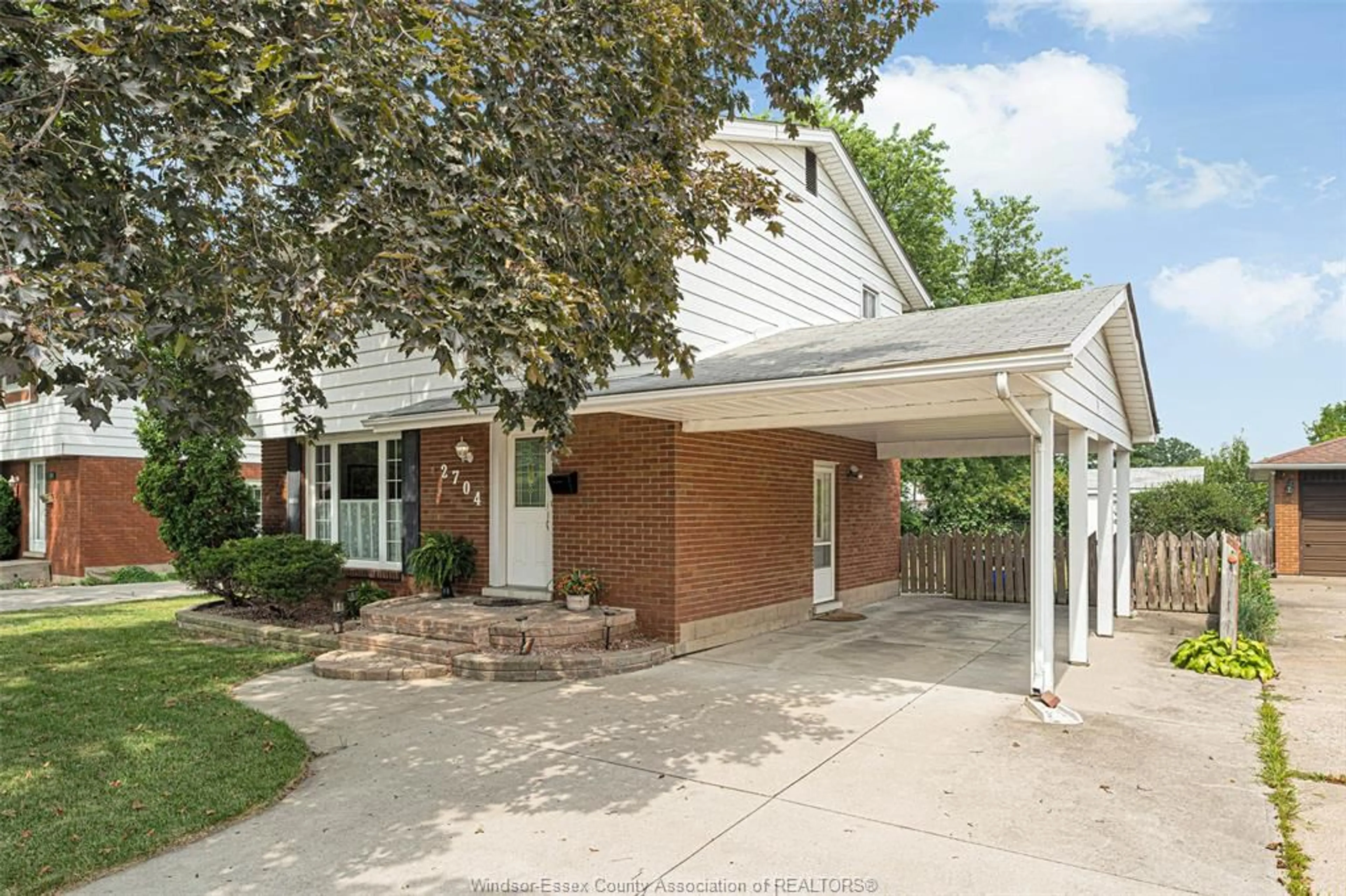 Home with brick exterior material, street for 2704 RIVARD Ave, Windsor Ontario N8T 2H5