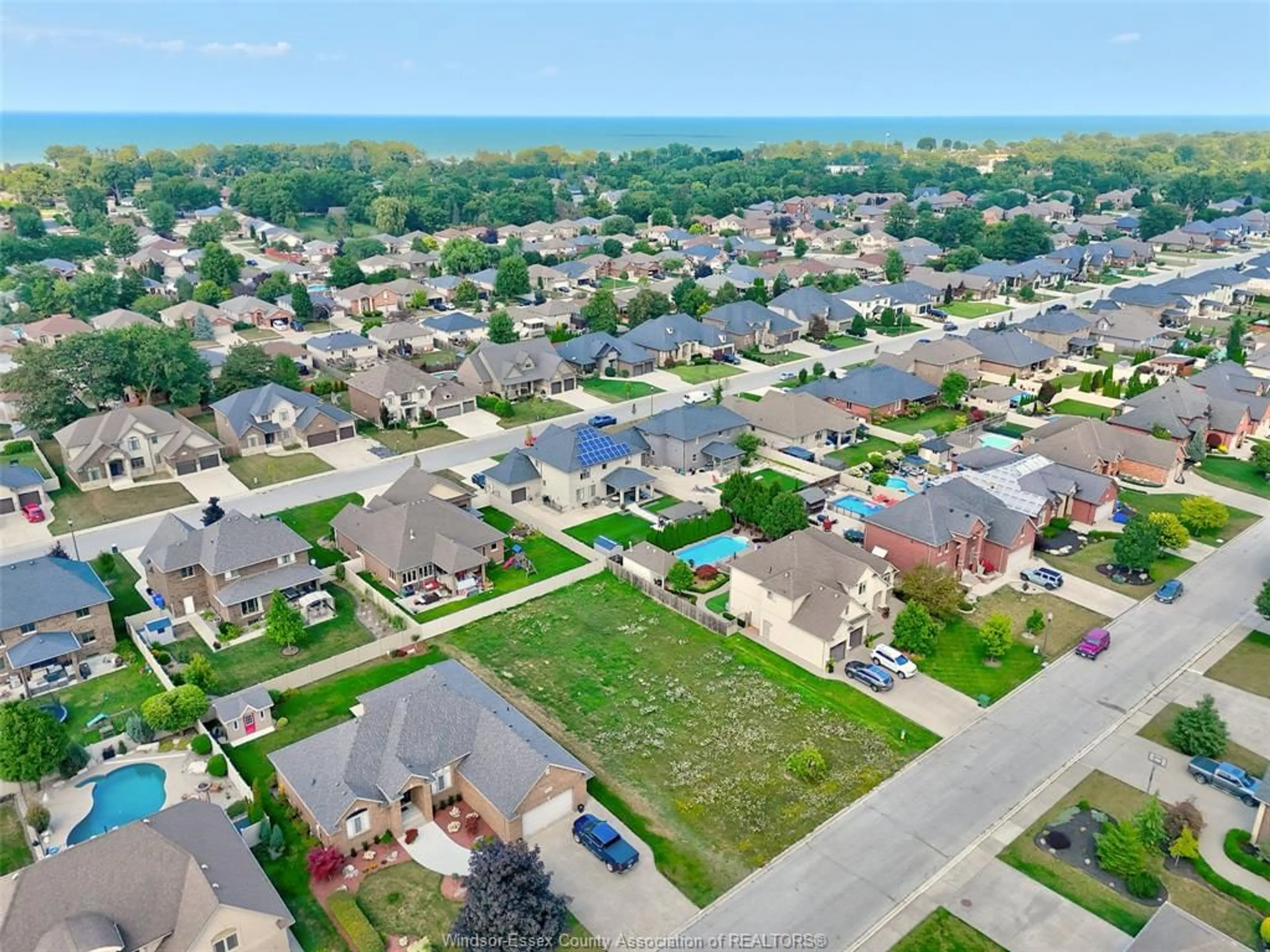 A pic from outside/outdoor area/front of a property/back of a property/a pic from drone, street for 1076 REGENCY Cres, Lakeshore Ontario N8L 0W1