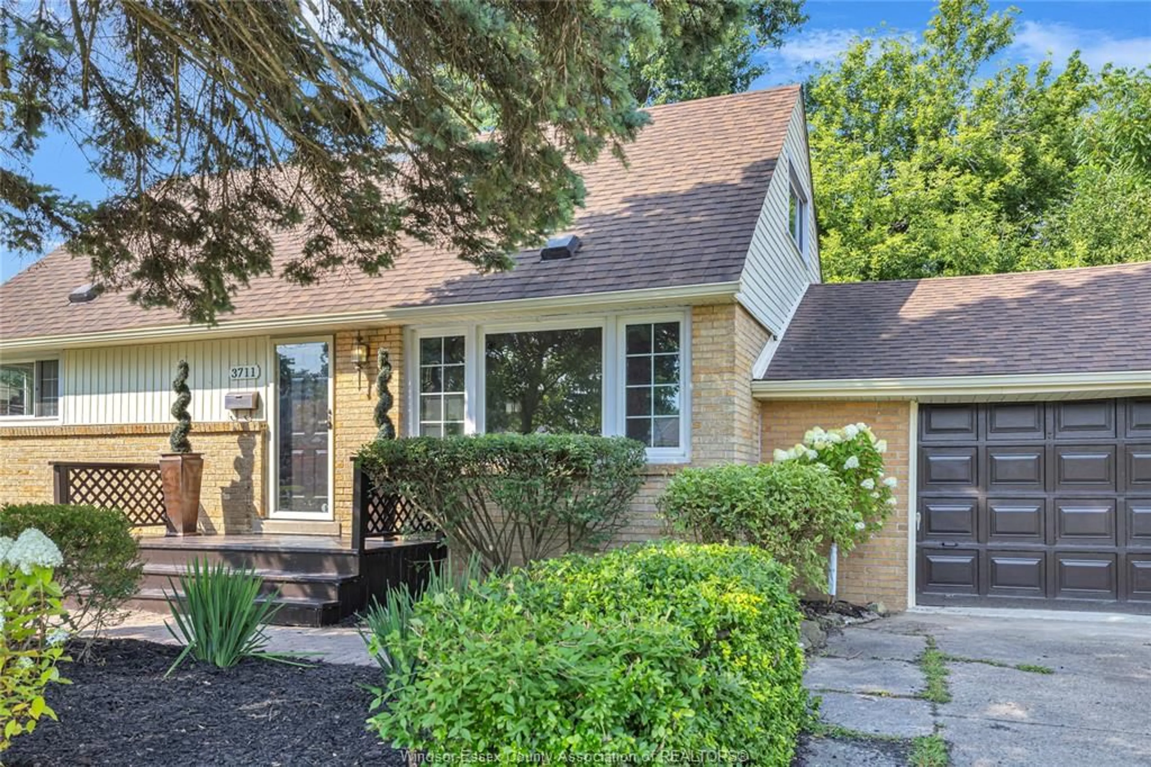 Home with vinyl exterior material, street for 3711 DANDURAND Ave, Windsor Ontario N9E 2G4