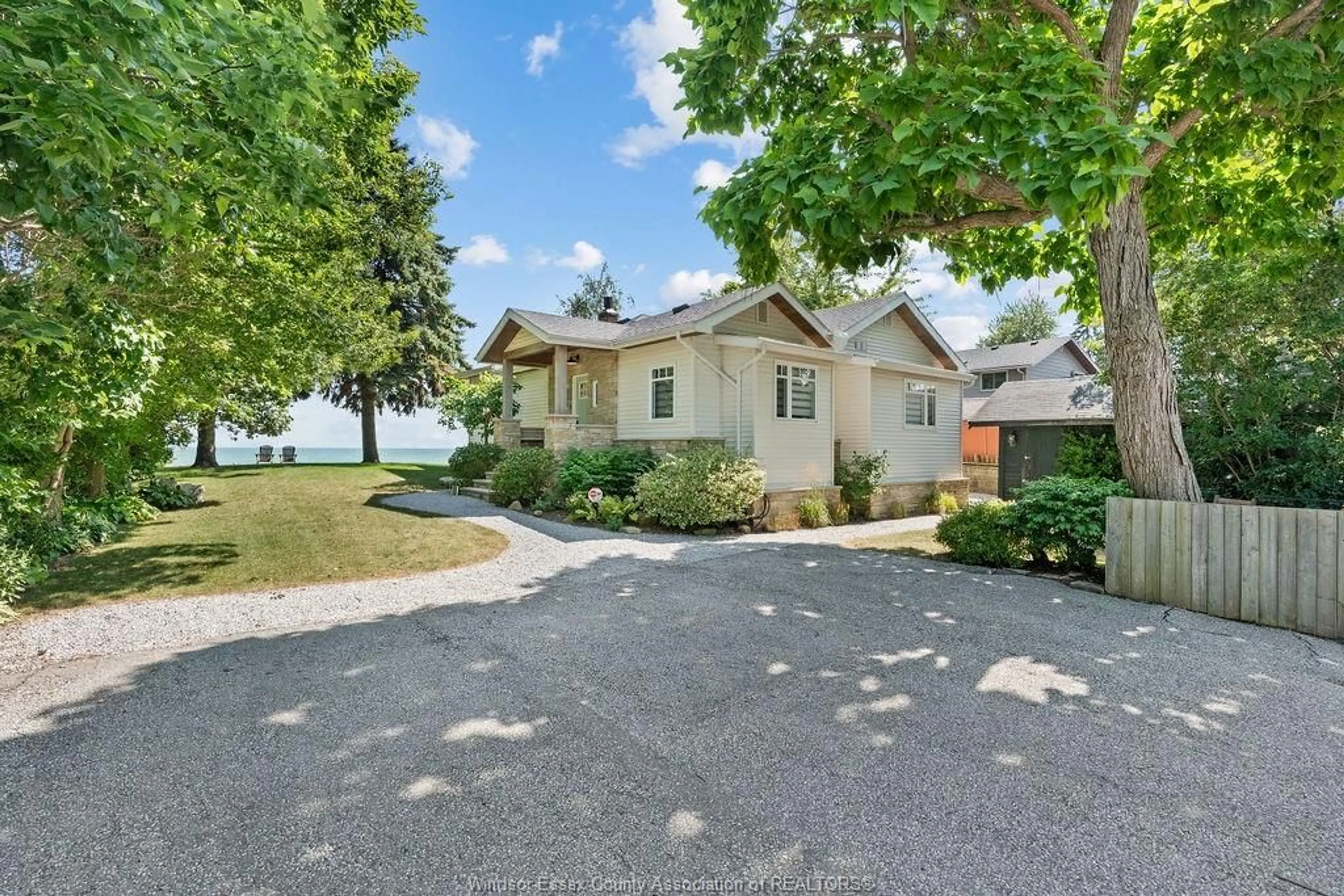 A pic from outside/outdoor area/front of a property/back of a property/a pic from drone, water/lake/river/ocean view for 1295 HERITAGE Rd, Kingsville Ontario N9Y 2E6