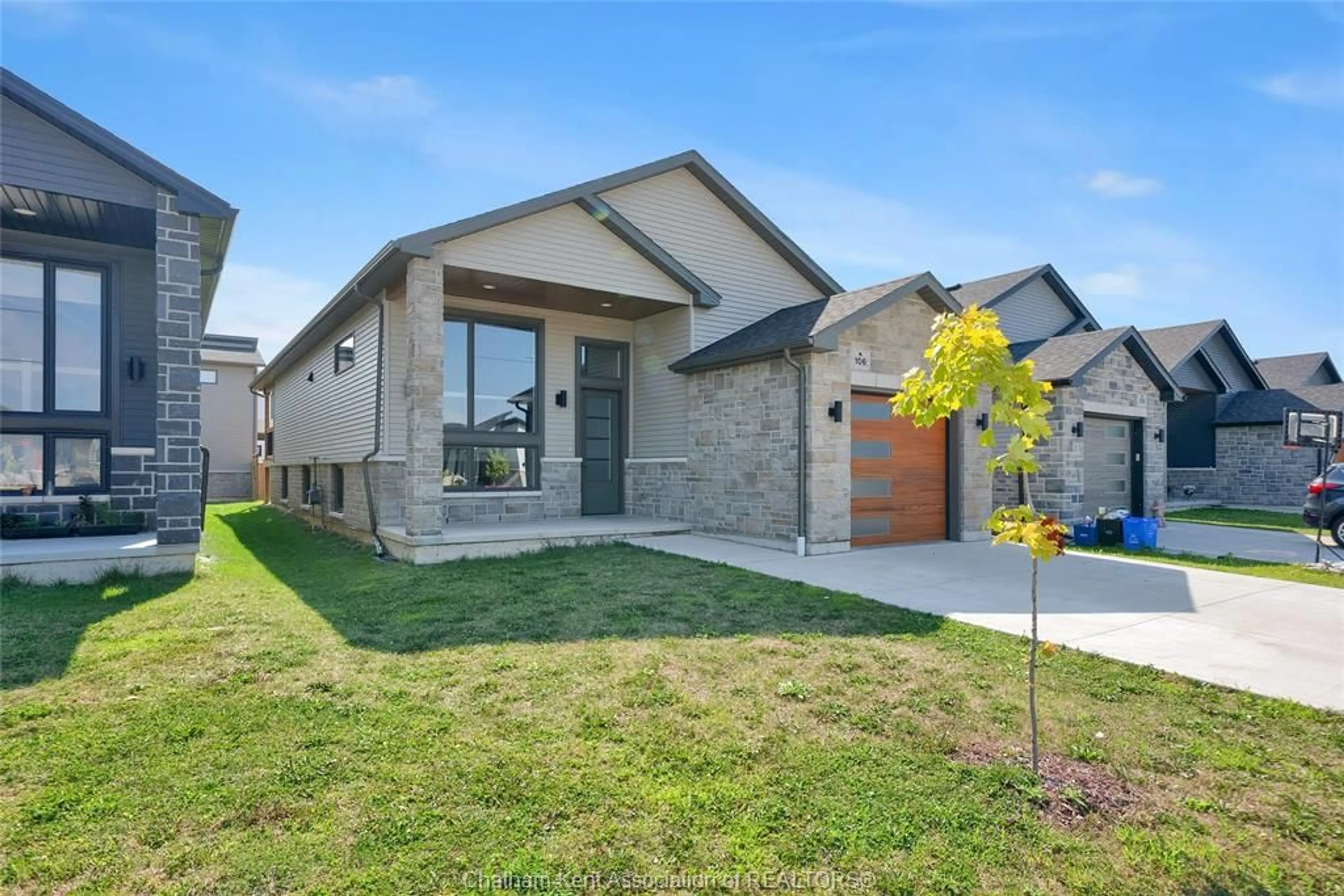 Home with brick exterior material, street for 106 Ironwood Trail, Chatham Ontario N7M 0T3