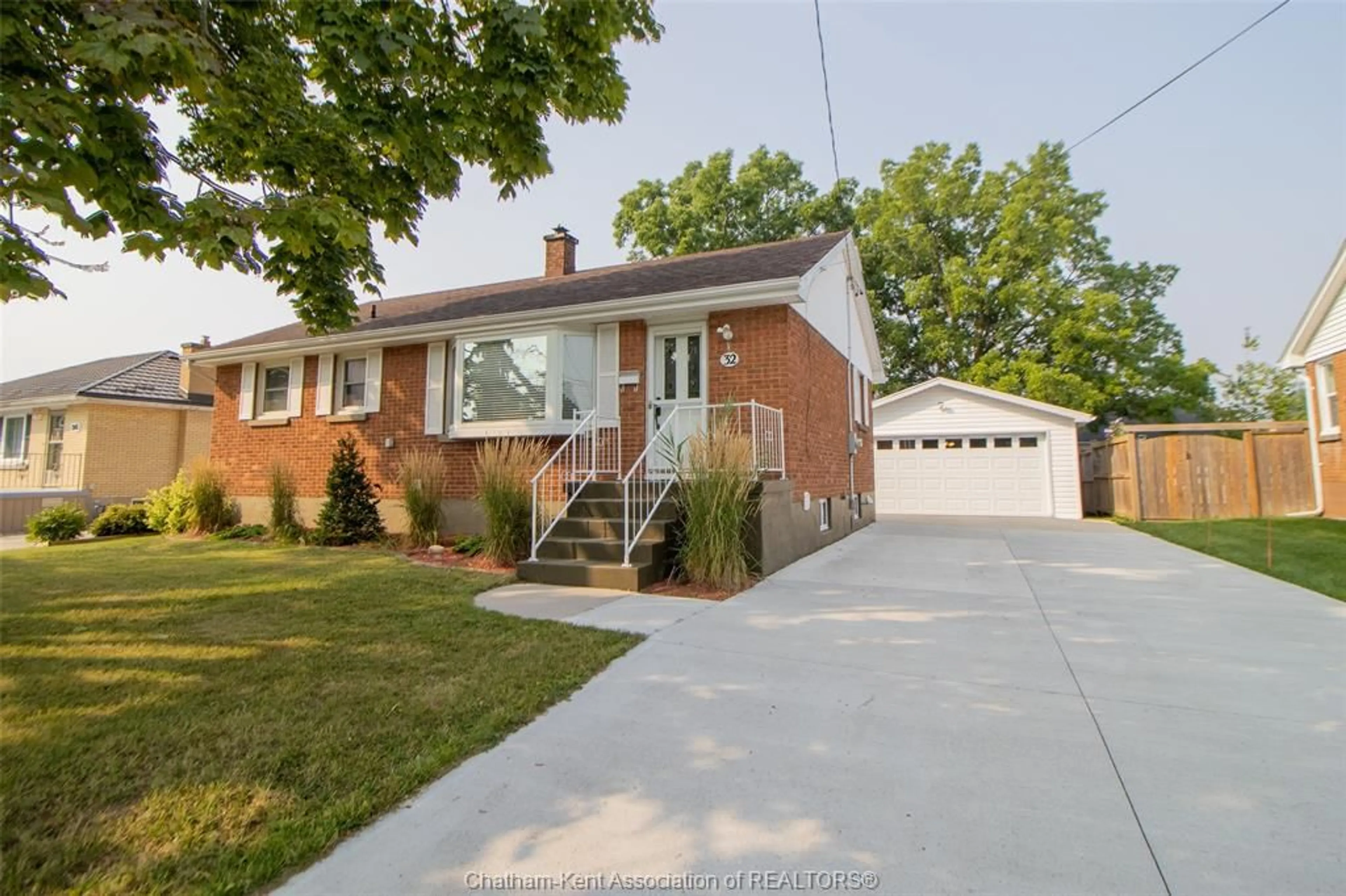 Home with brick exterior material, street for 32 Simonton Dr, Chatham Ontario N7M 5C6