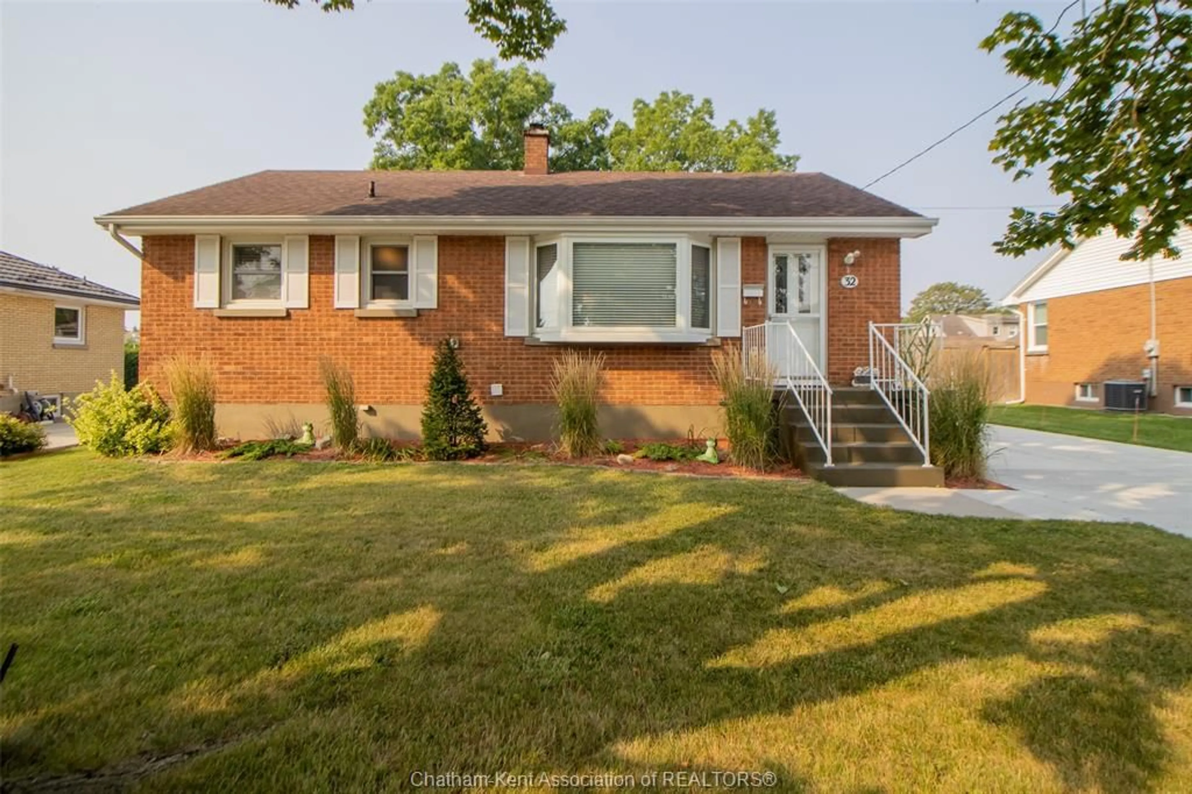 Home with brick exterior material, street for 32 Simonton Dr, Chatham Ontario N7M 5C6