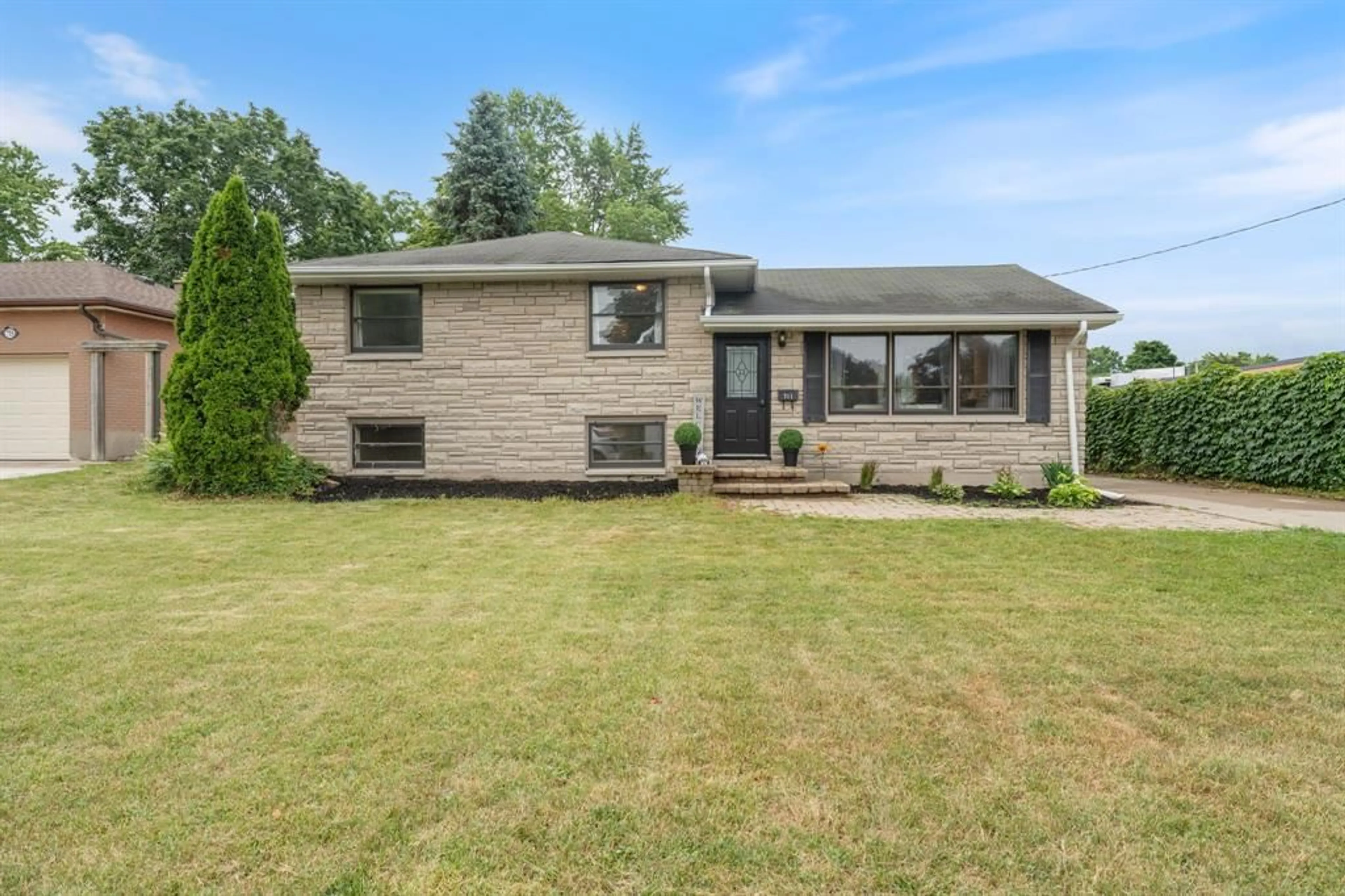Home with brick exterior material, street for 711 Cathcart Blvd, Sarnia Ontario N7V 2N6