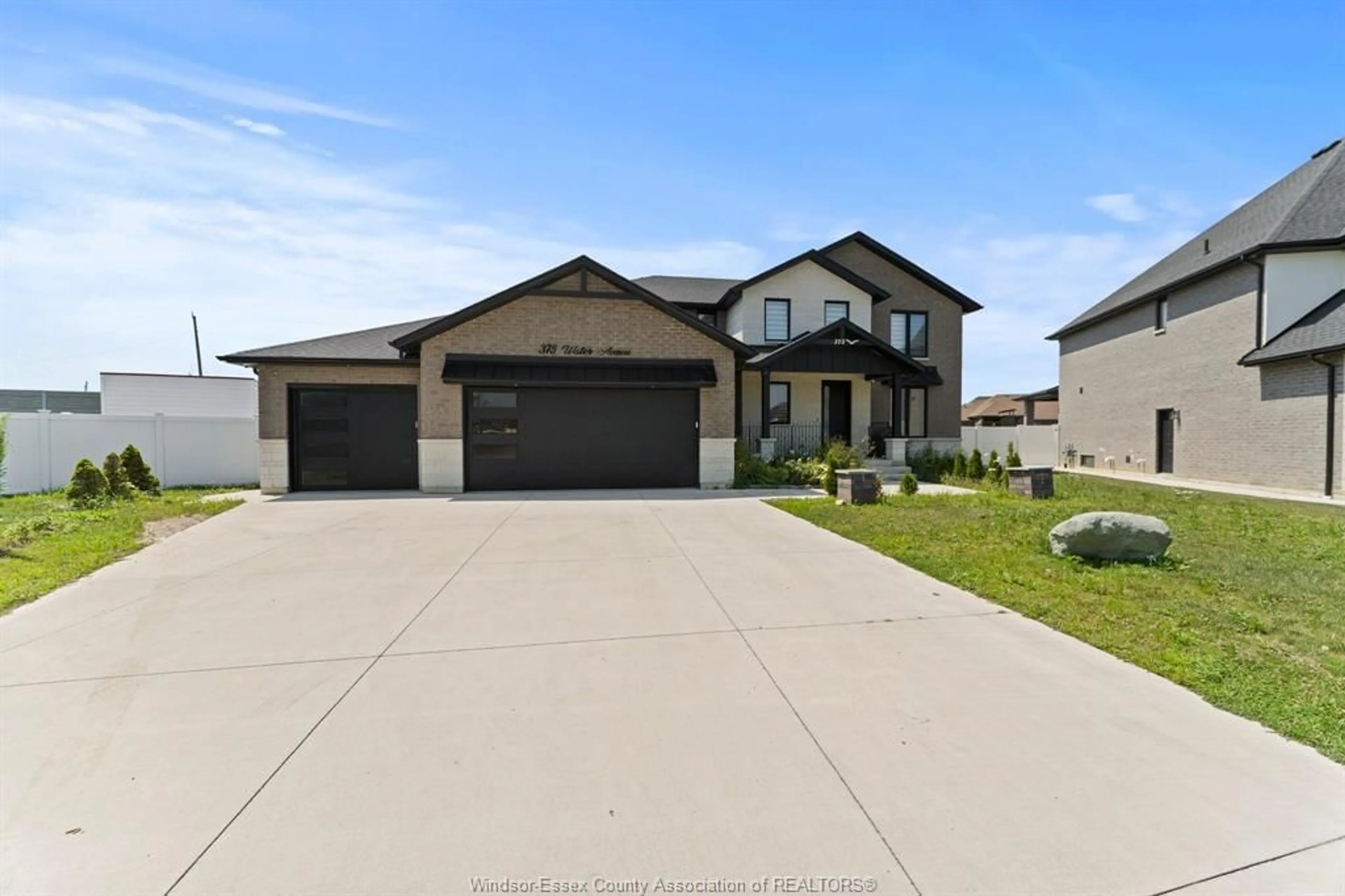 Home with vinyl exterior material, street for 375 WATER Ave, Lakeshore Ontario N0R 1A0