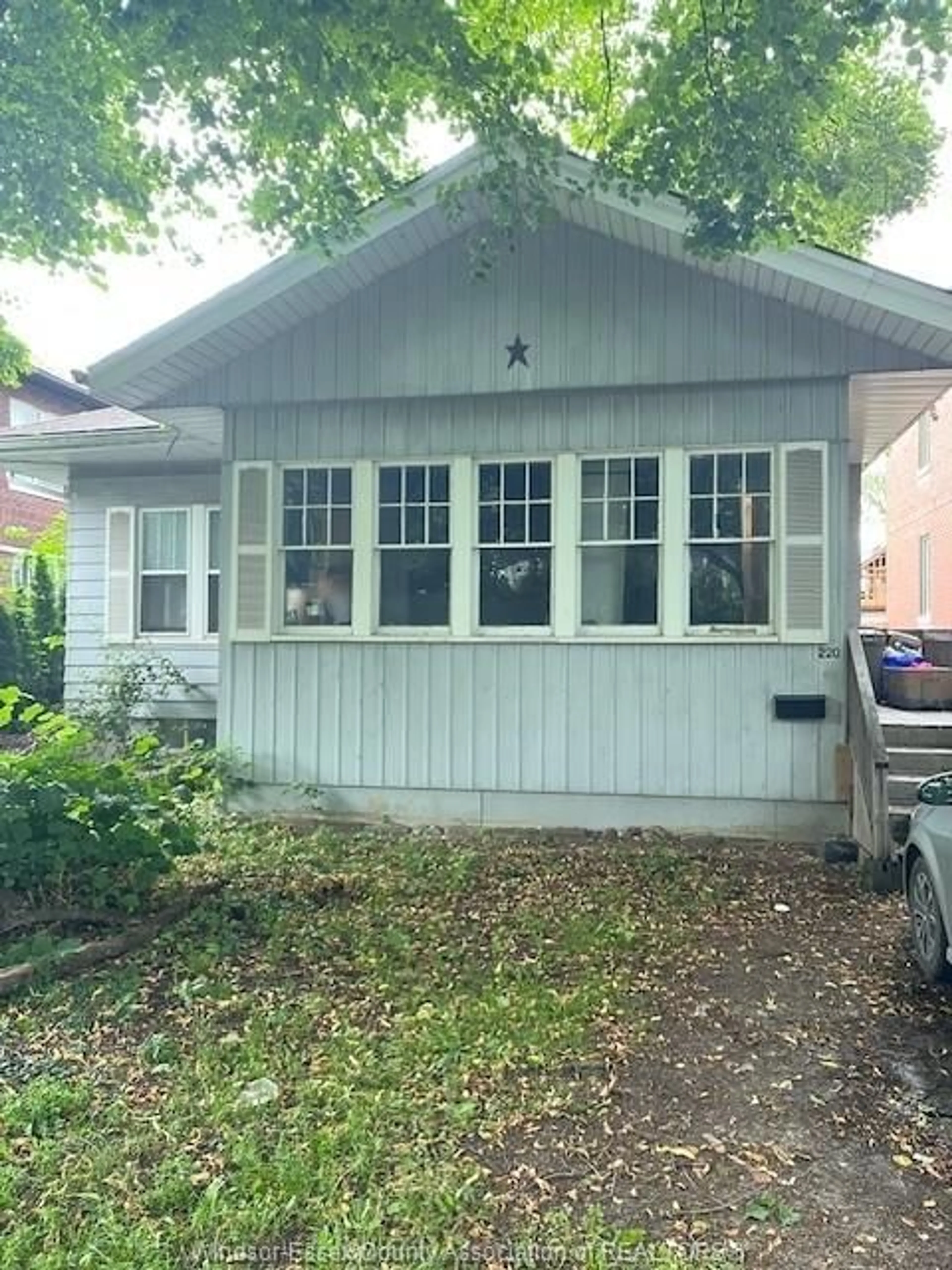 Home with vinyl exterior material, street for 220 MCEWAN, Windsor Ontario N9B 2E4