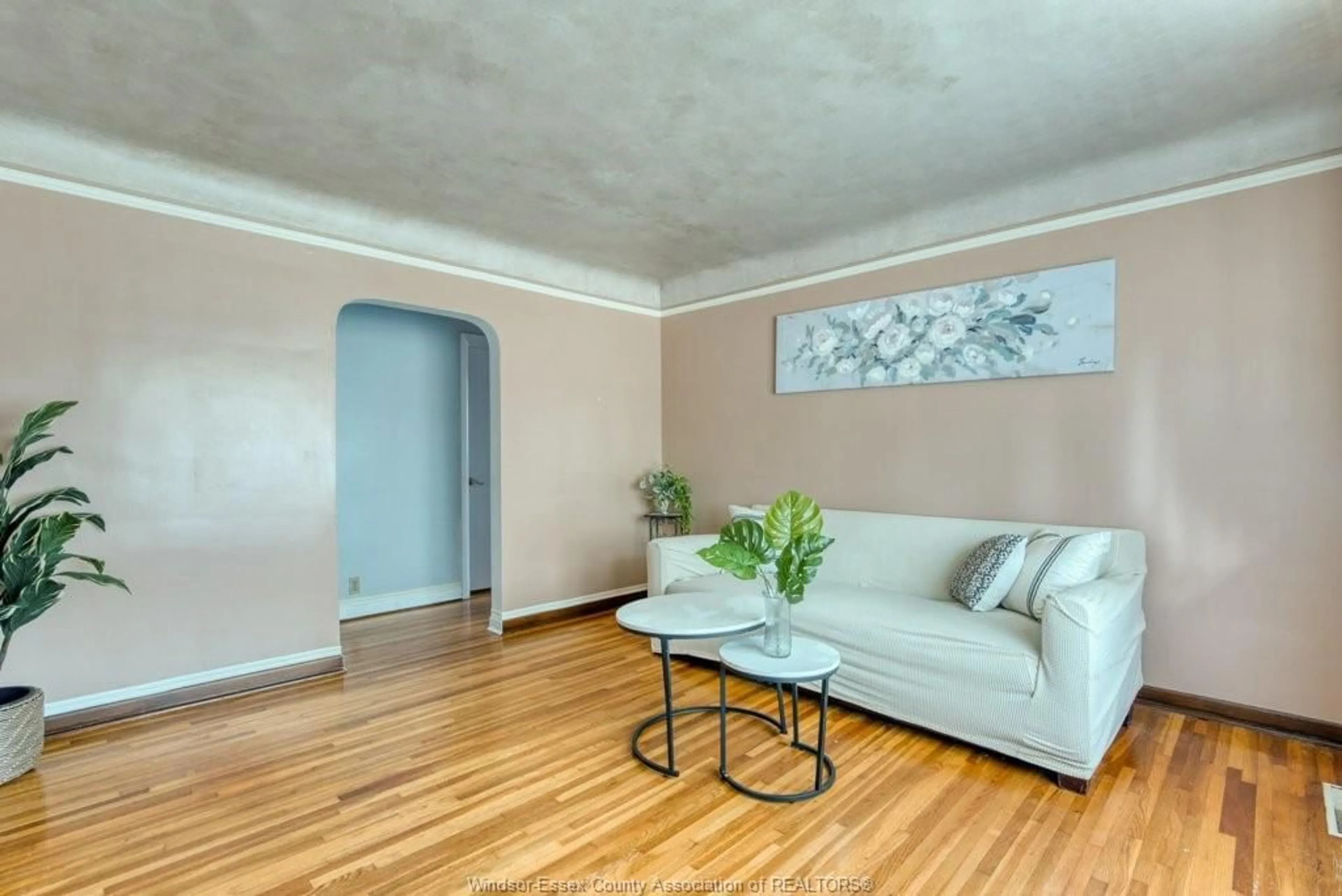 Living room with furniture, wood/laminate floor for 3277 DOMINION, Windsor Ontario N9E 2N6