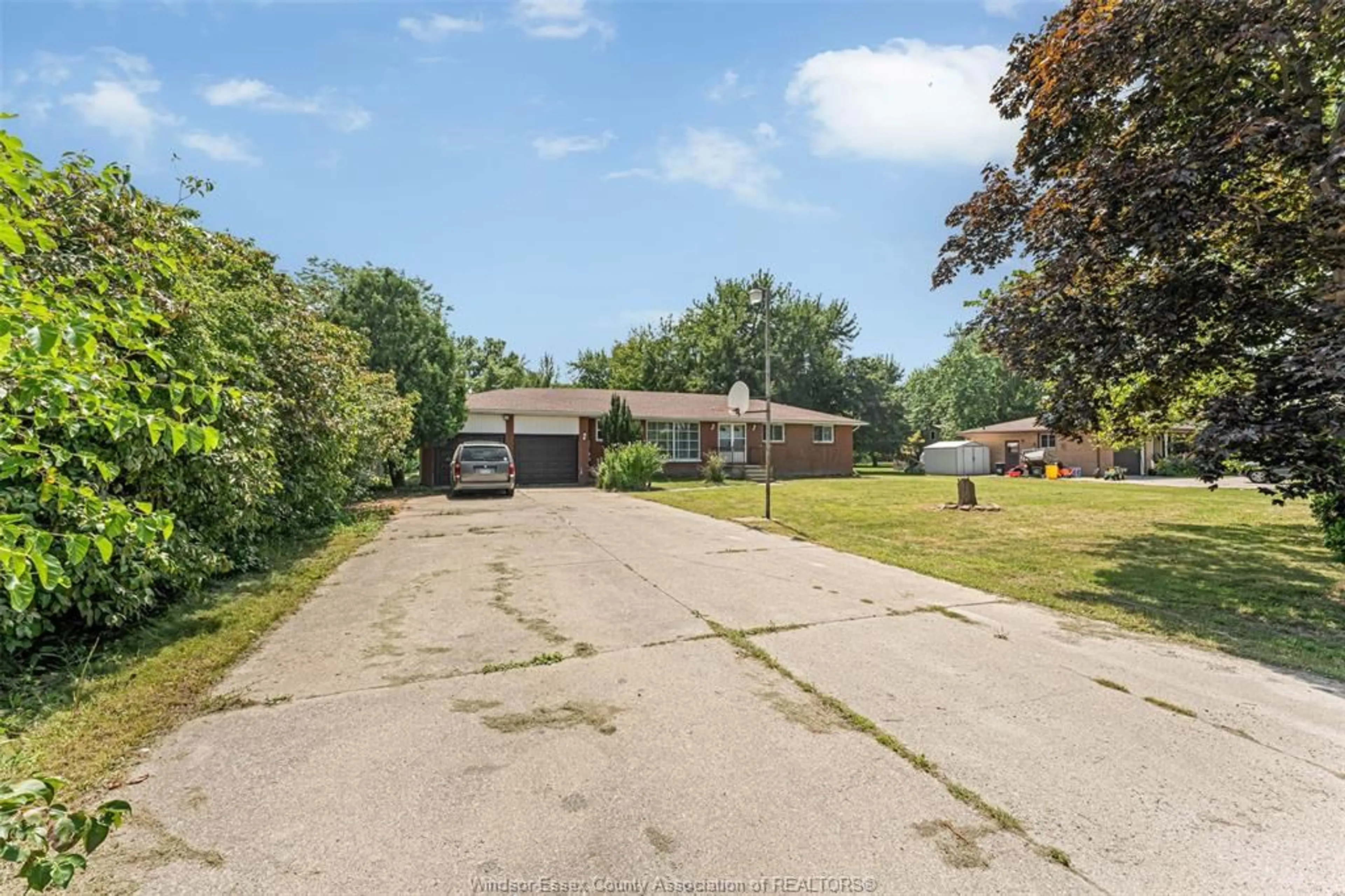 A pic from outside/outdoor area/front of a property/back of a property/a pic from drone, street for 8061 MIDDLE SIDE Rd, Amherstburg Ontario N0R 1J0