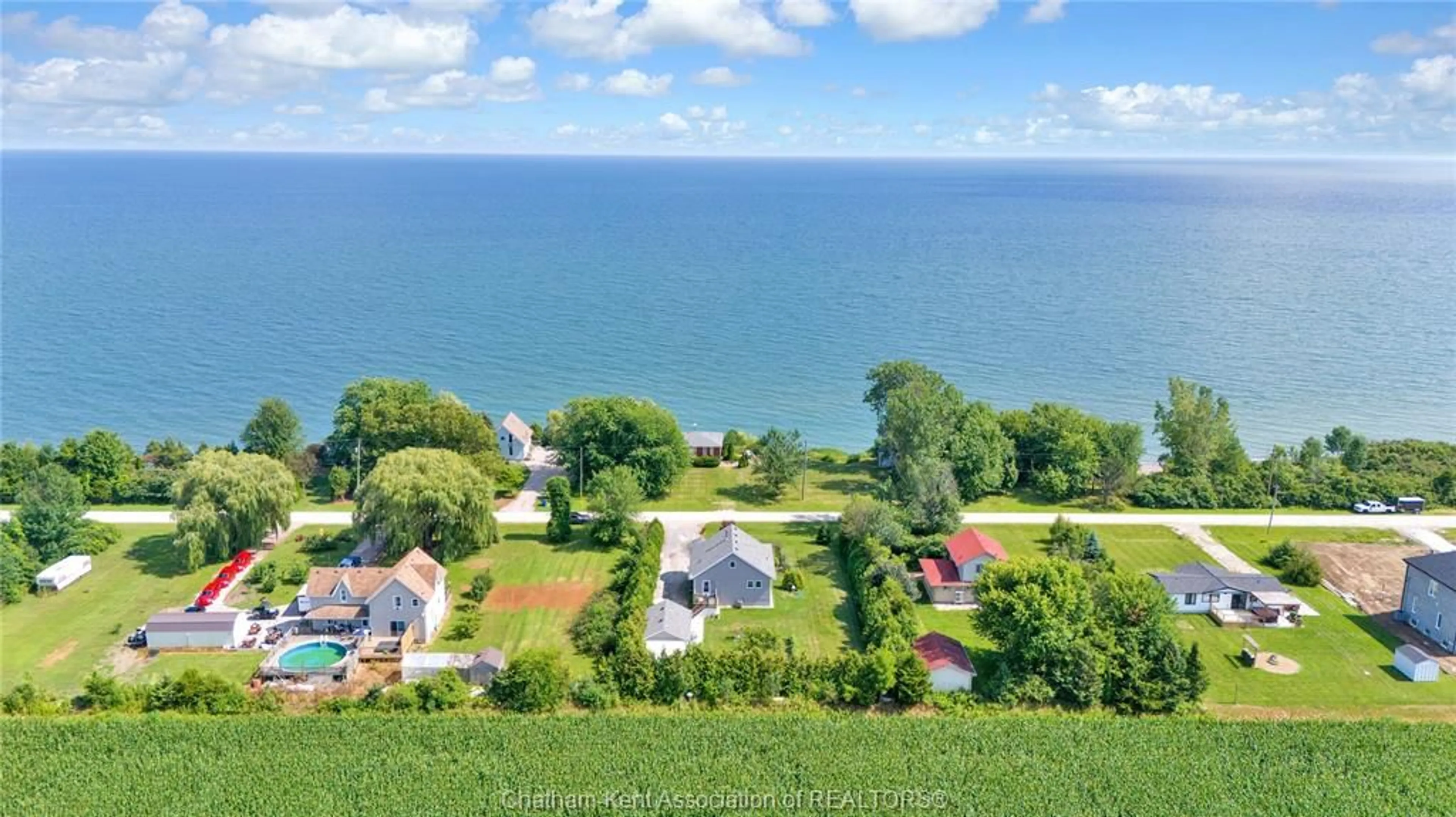 A pic from outside/outdoor area/front of a property/back of a property/a pic from drone, water/lake/river/ocean view for 1311 Bluff Line, Wheatley Ontario N0P 2C0