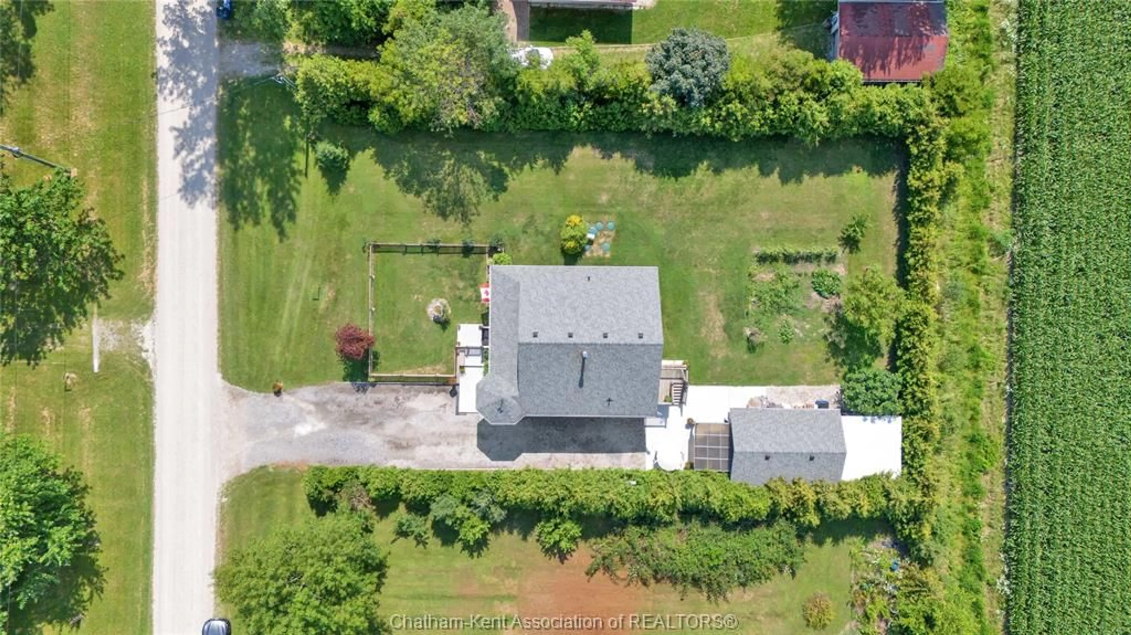 A pic from outside/outdoor area/front of a property/back of a property/a pic from drone, street for 1311 Bluff Line, Wheatley Ontario N0P 2C0