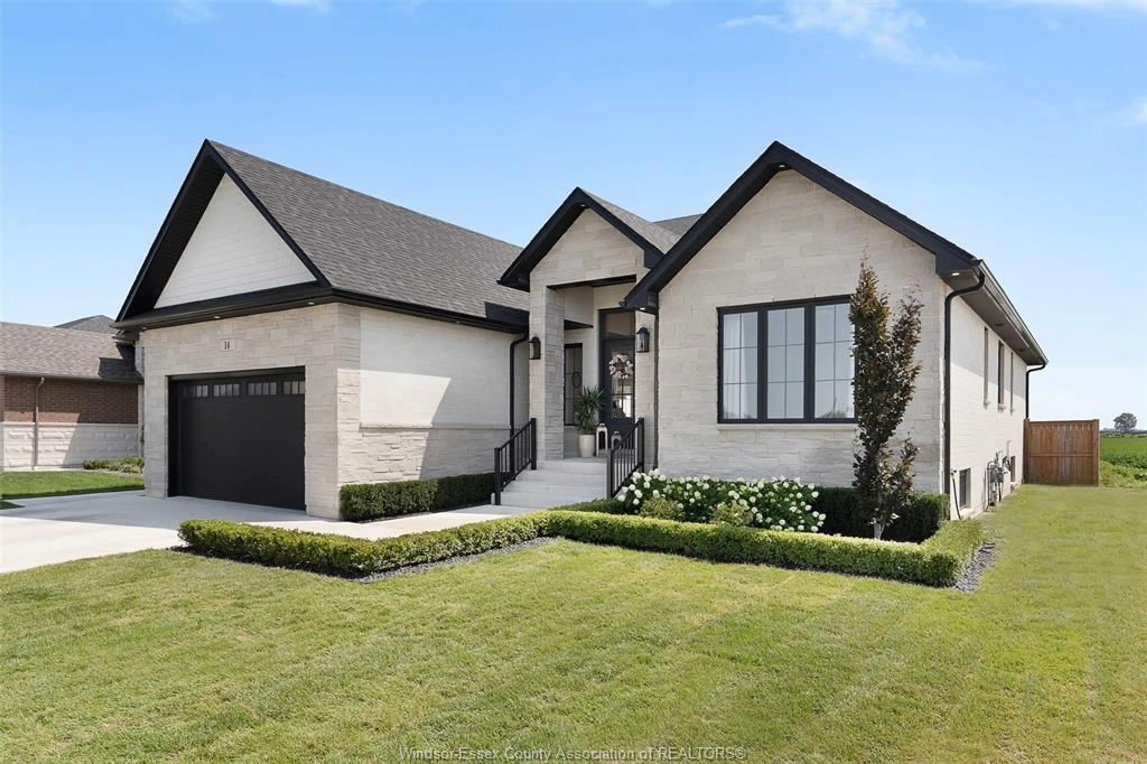 Home with brick exterior material, street for 14 HEATHVIEW Trail, Leamington Ontario N8H 0C5