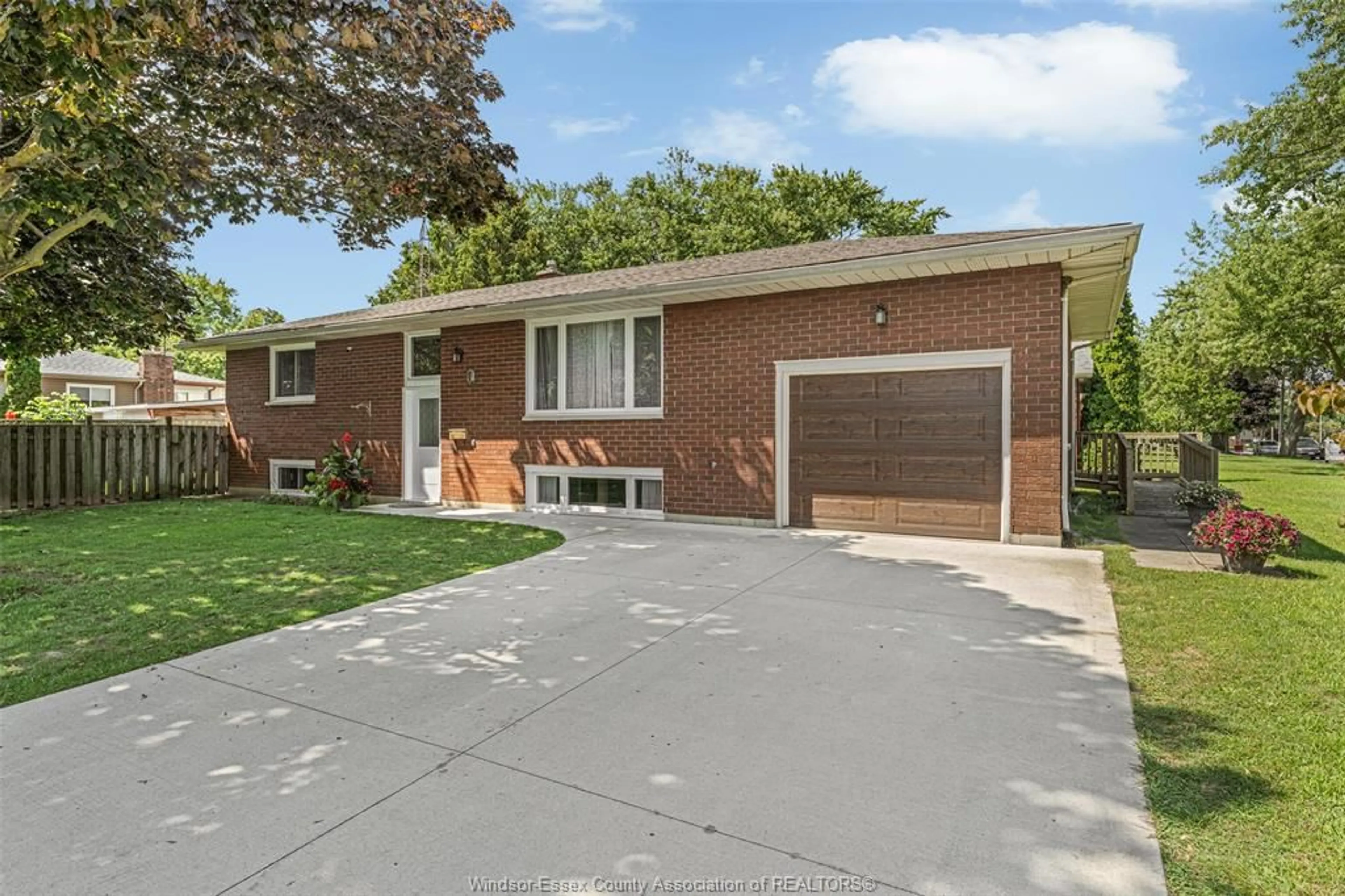 Home with brick exterior material, street for 1 SUTTON Dr, Leamington Ontario N8H 4P3