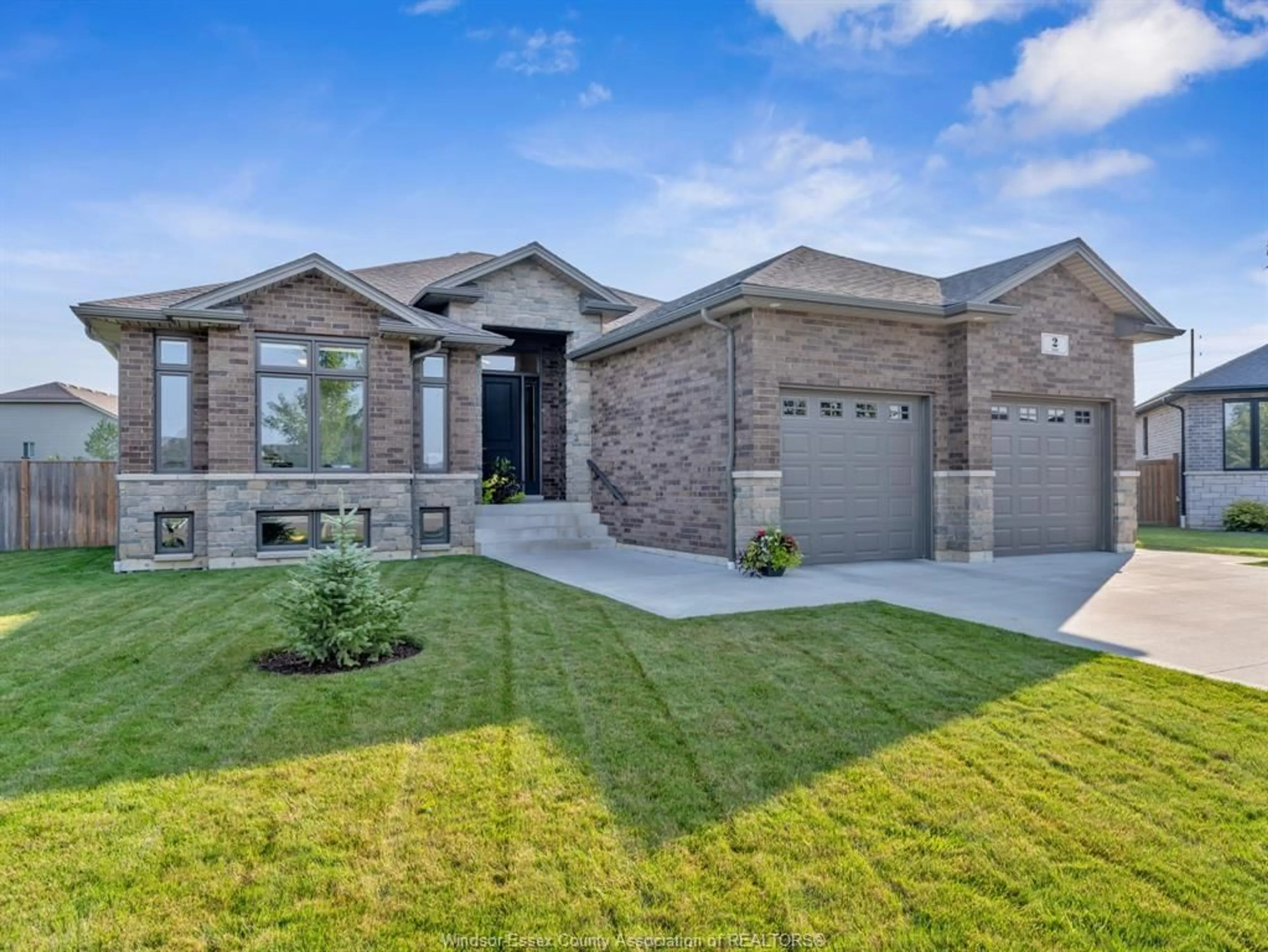 Home with brick exterior material, street for 2 OLIVE Dr, Leamington Ontario N8E 0E7